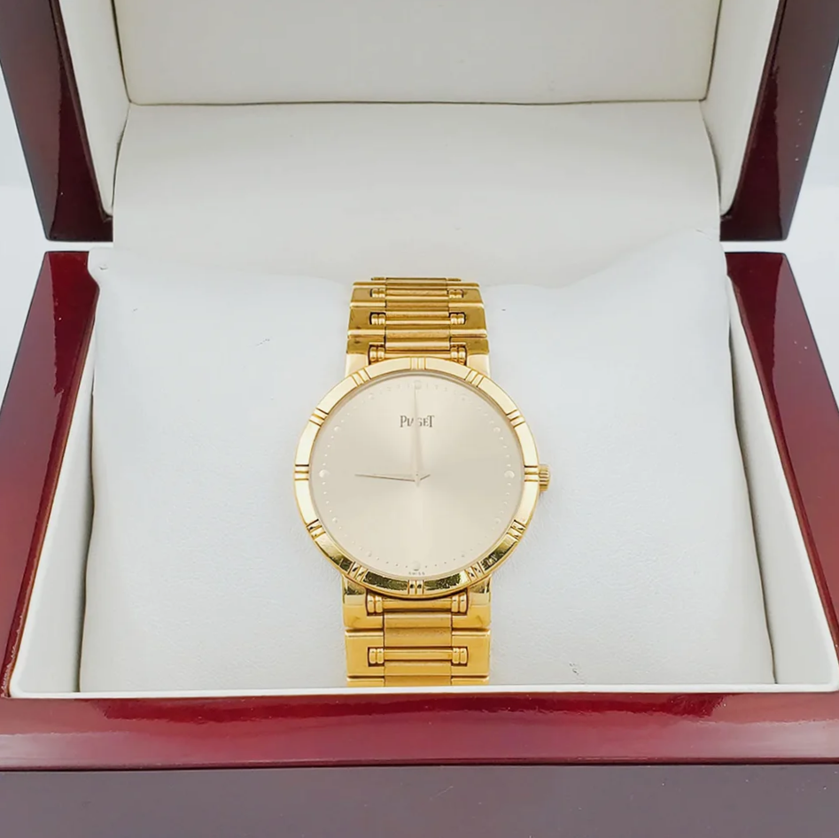 *Men's Piaget 31mm Dancer Vintage Solid 18K Yellow Gold Band Watch with Champagne Dial. (Pre-Owned)