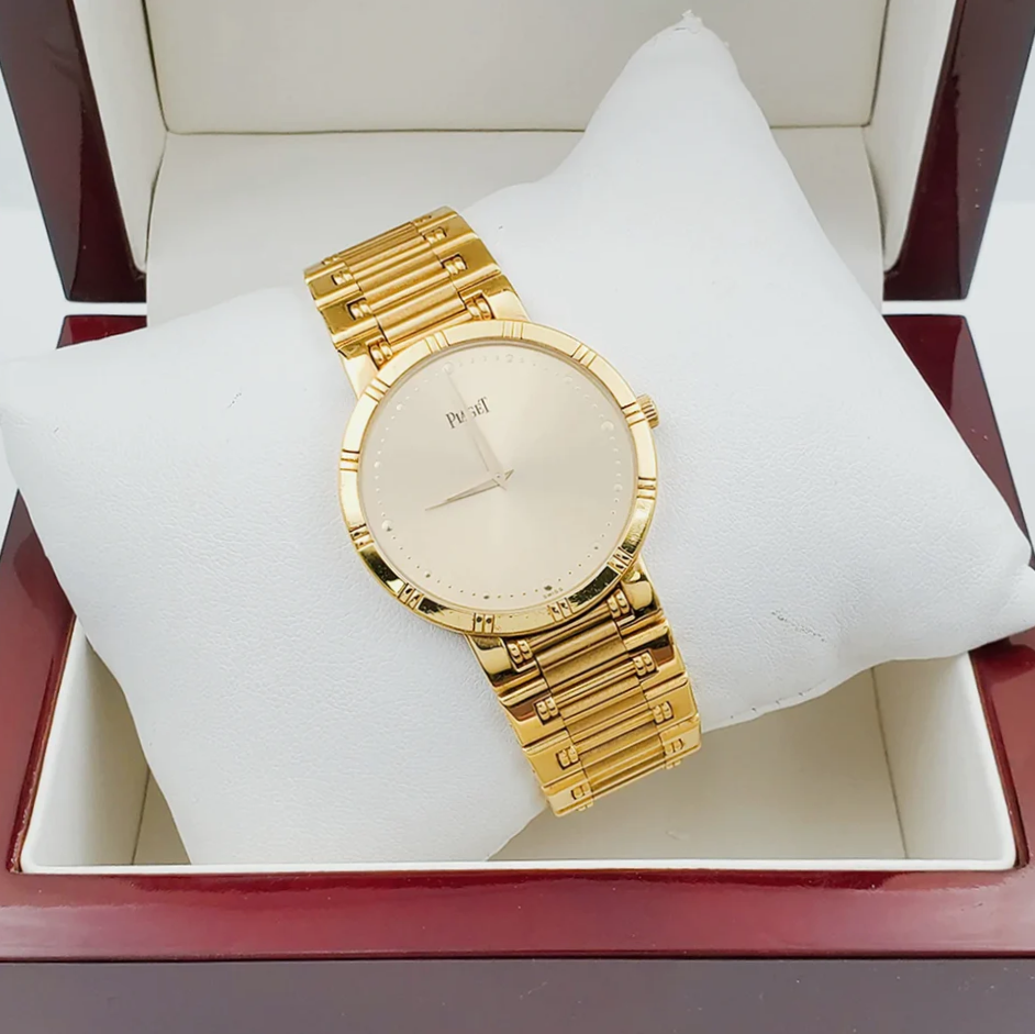 *Men's Piaget 31mm Dancer Vintage Solid 18K Yellow Gold Band Watch with Champagne Dial. (Pre-Owned)