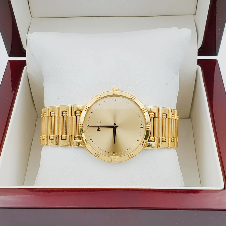 *Men's Piaget 31mm Dancer Vintage Solid 18K Yellow Gold Band Watch with Champagne Dial. (Pre-Owned)