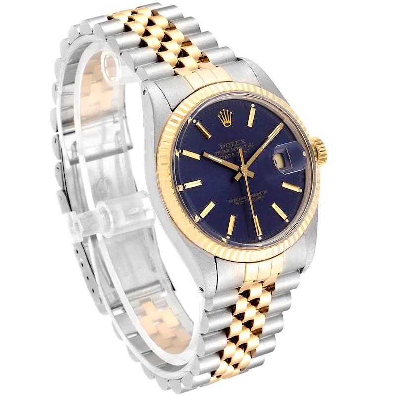 Men's Rolex 36mm DateJust Two Tone 18K Yellow Gold / Stainless Steel Watch with Purple Dial and Fluted Bezel. (Pre-Owned 16013)