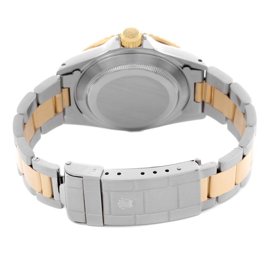 1993 Men's Rolex Submariner 40mm Oyster Perpetual Two Tone 18K Yellow Gold / Stainless Steel Watch with Blue Dial and Blue Bezel. (Pre-Owned 16613)
