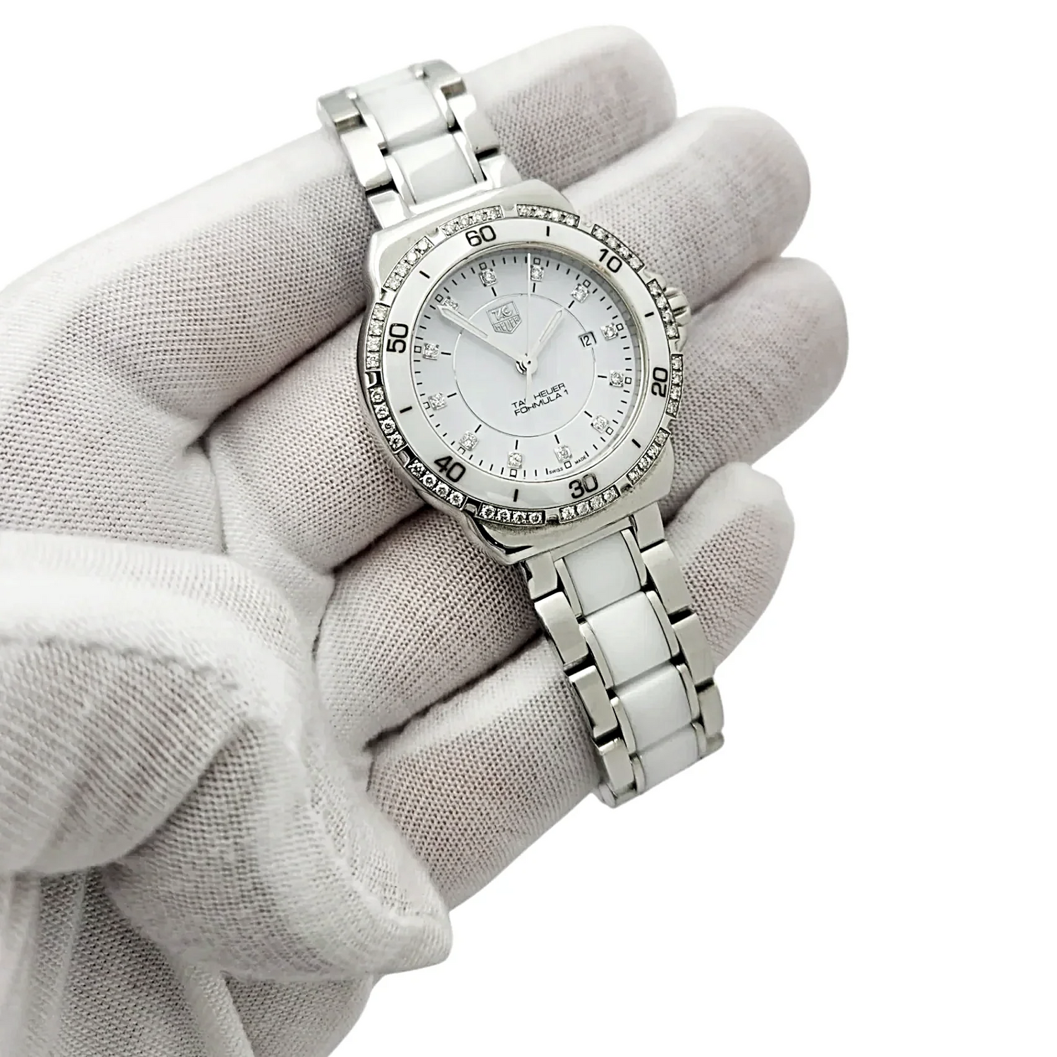 Ladies TAG Heuer 32mm Formula 1 Ceramic Watch with White Diamond Dial and Diamond Bezel. (Pre-Owned WAH1313)