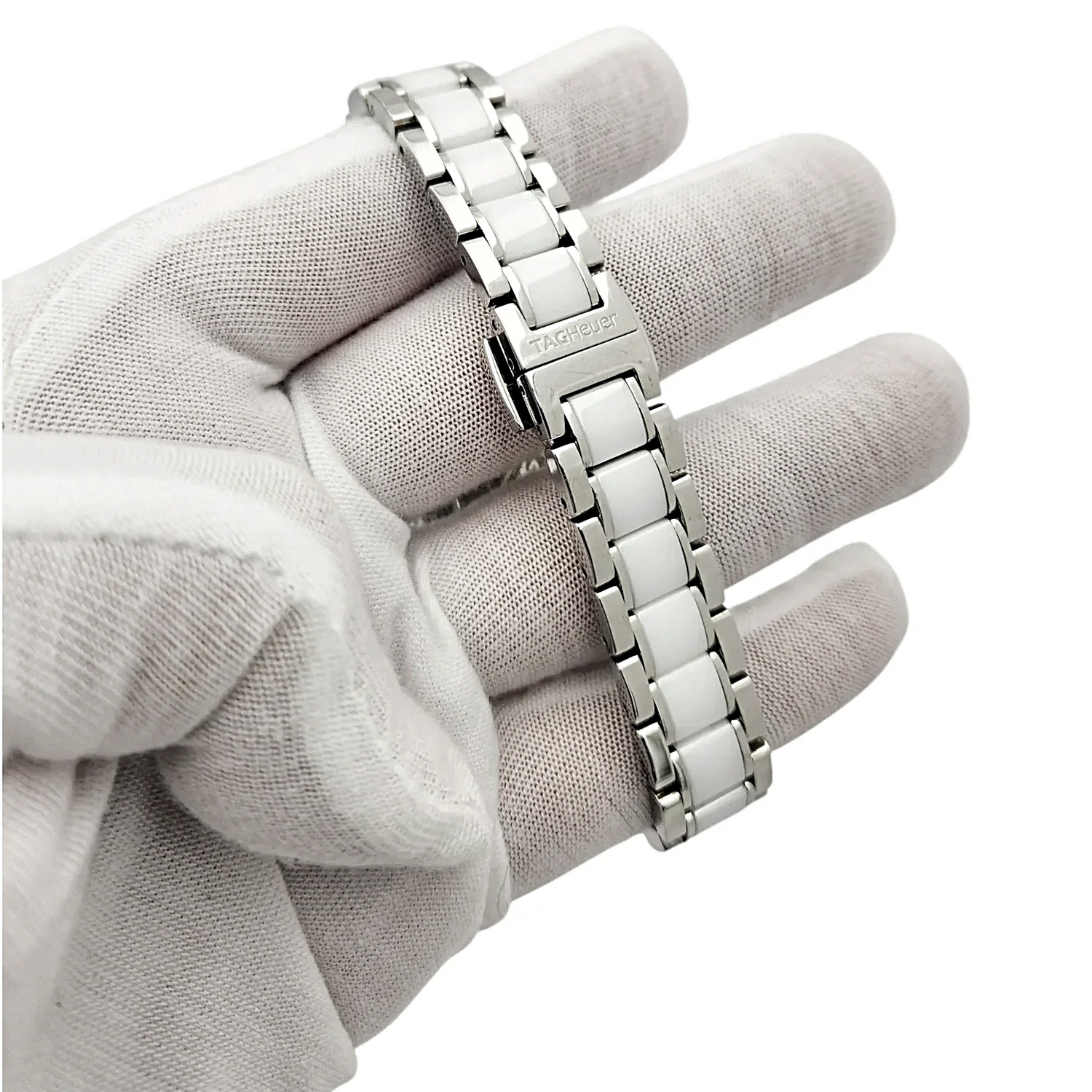 Ladies TAG Heuer 32mm Formula 1 Ceramic Watch with White Diamond Dial and Diamond Bezel. (Pre-Owned WAH1313)