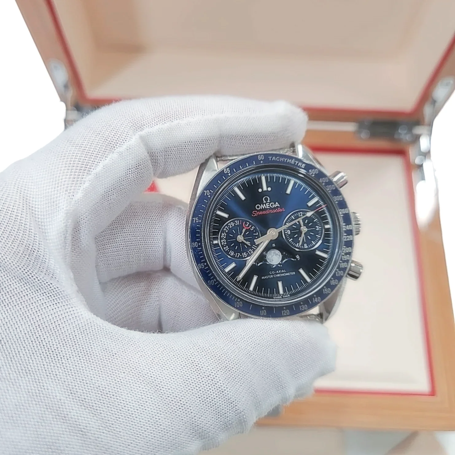 Men's Omega 44mm Speedmaster Moonphase Automatic Steel Watch with Blue Luminous Dial. (Pre-Owned Box/Card)