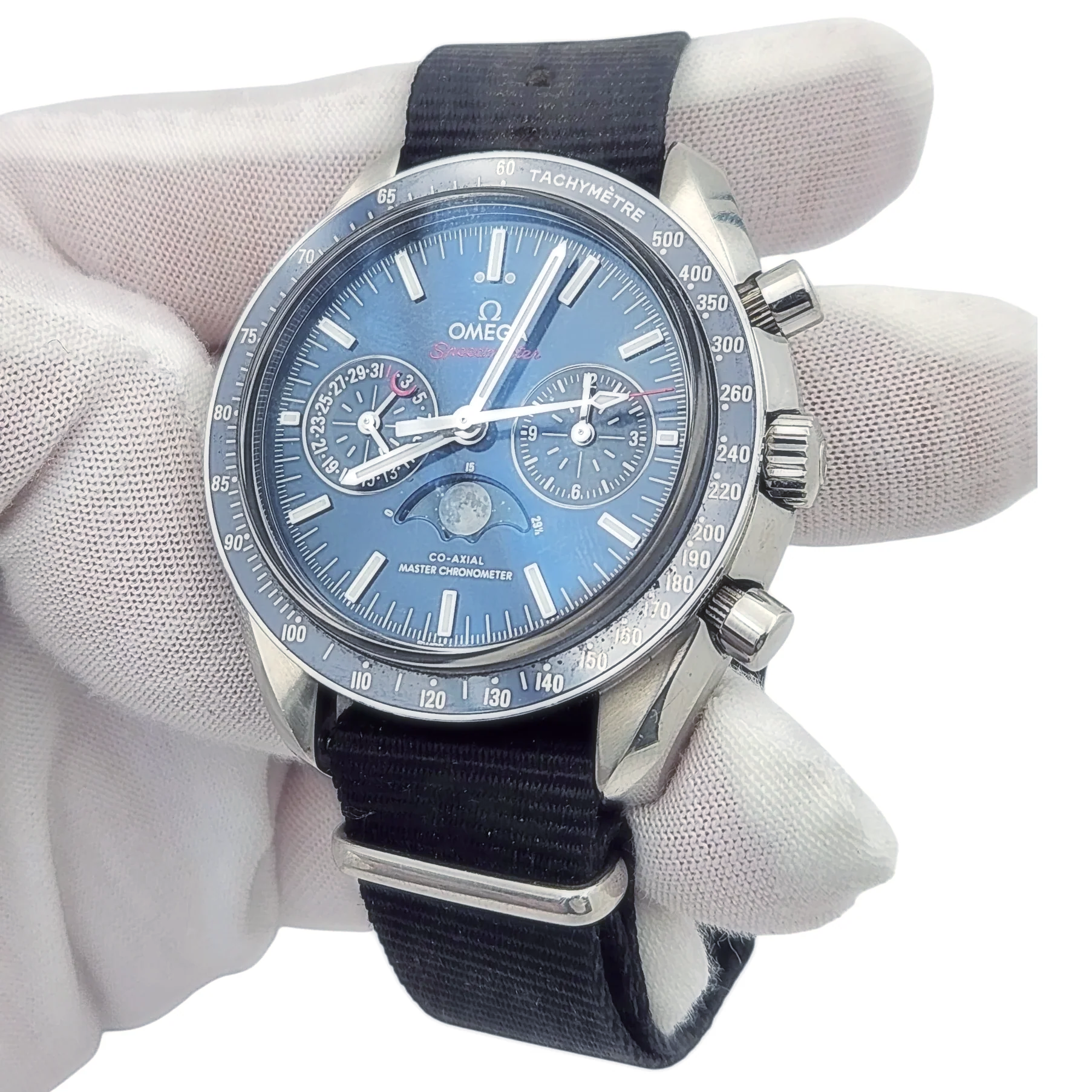 Men's Omega 44mm Speedmaster Moonphase Automatic Steel Watch with Blue Luminous Dial. (Pre-Owned Box/Card)