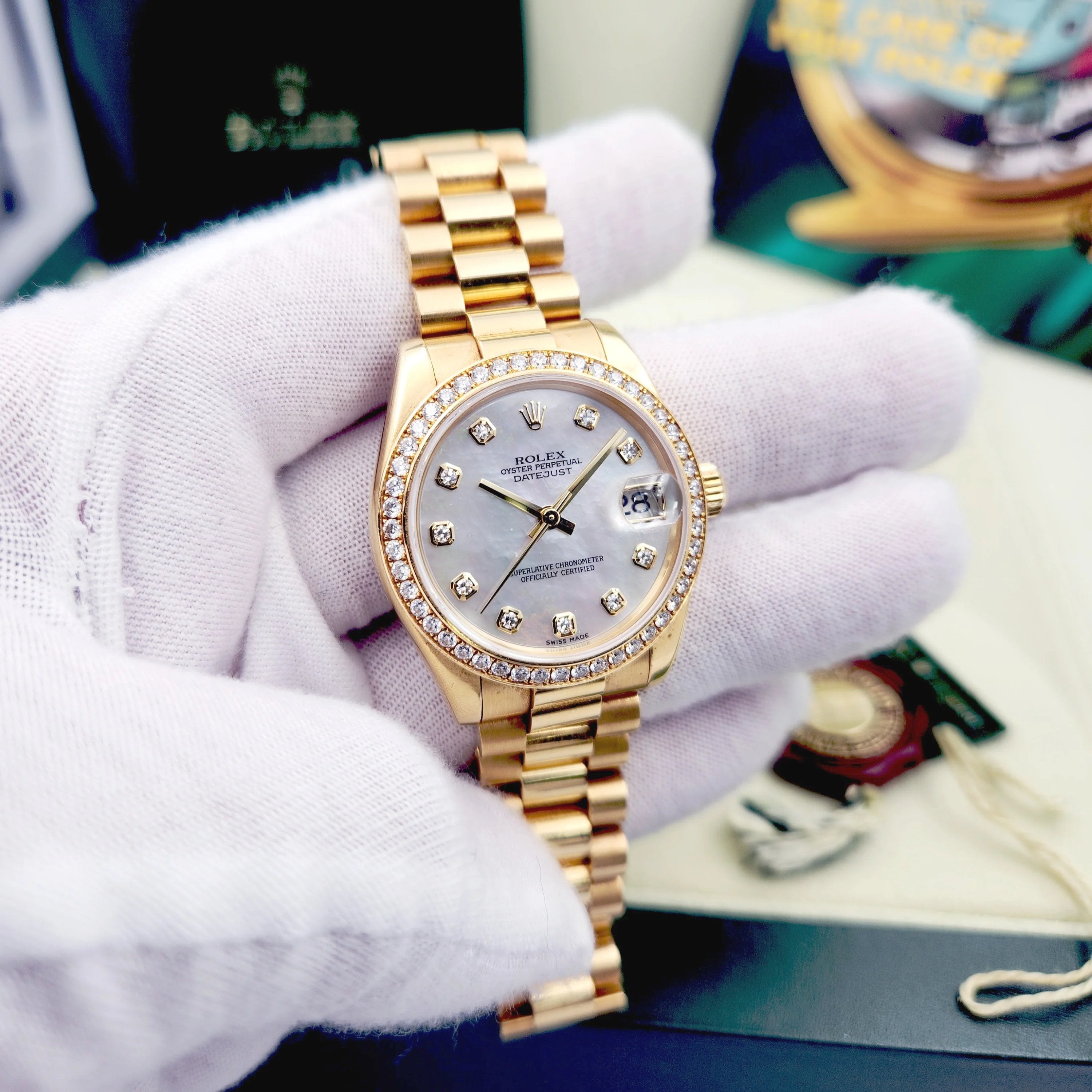2010 Ladies Rolex 31mm Midsize Presidential 18K Solid Yellow Gold Watch with Mother of Pearl Diamond Dial and Diamond Bezel. (Pre-Owned 178288)