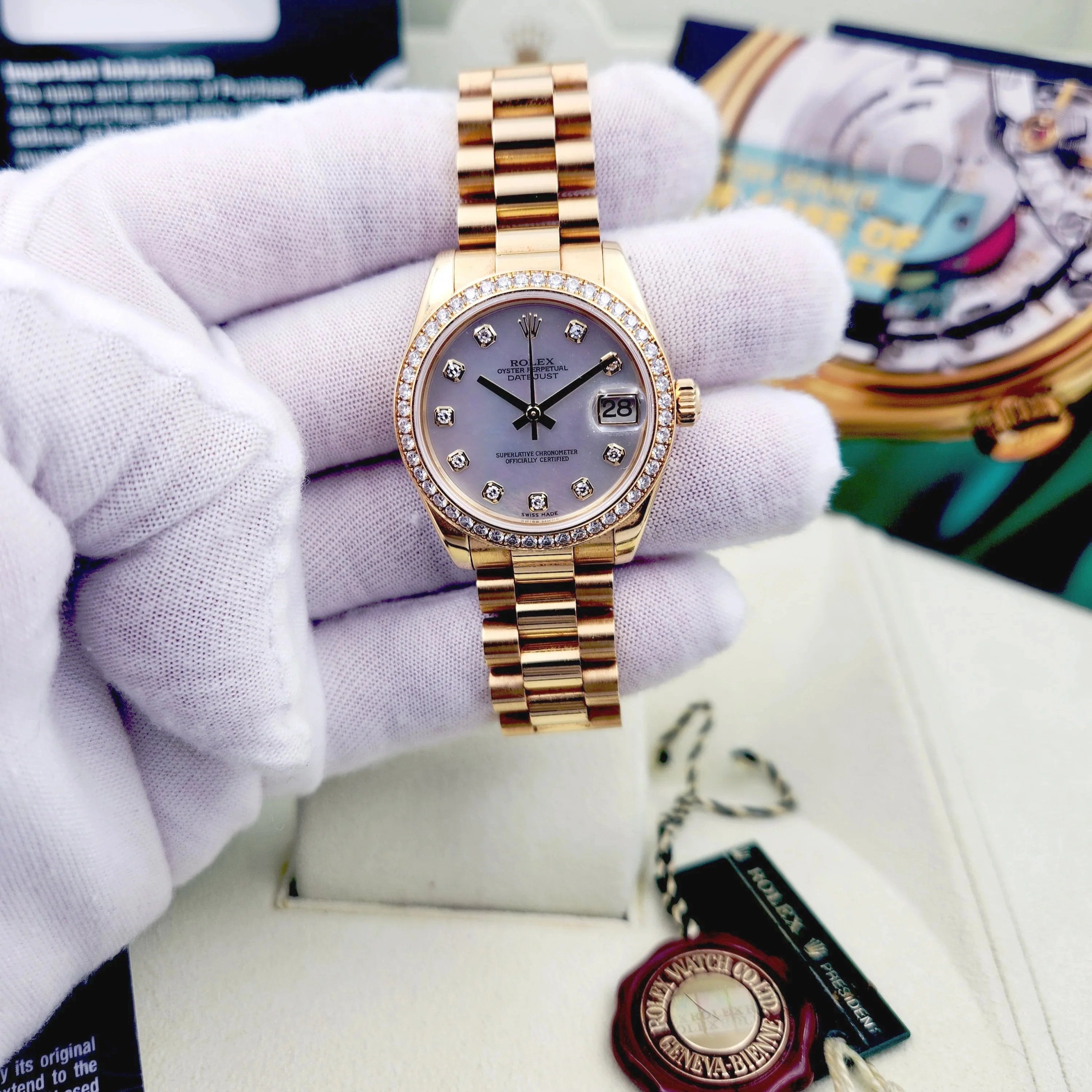 2010 Ladies Rolex 31mm Midsize Presidential 18K Solid Yellow Gold Watch with Mother of Pearl Diamond Dial and Diamond Bezel. (Pre-Owned 178288)