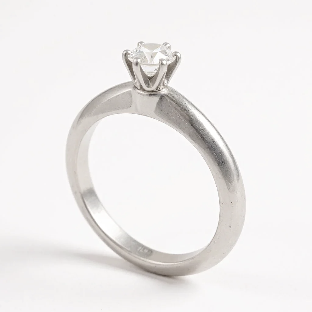 Tiffany & Co. Solitaire Round Cut 0.22 Ct. Diamond I Color, VS2 Clarity Platinum Engagement Ring. (Pre-Owned)