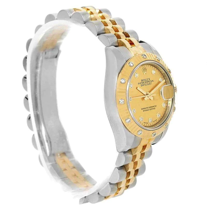 Ladies Rolex 26mm DateJust 18K Yellow Gold / Stainless Steel Two Tone Wristwatch w/ Gold Diamond Dial & Diamond Fluted Bezel. (Pre-Owned 179313)