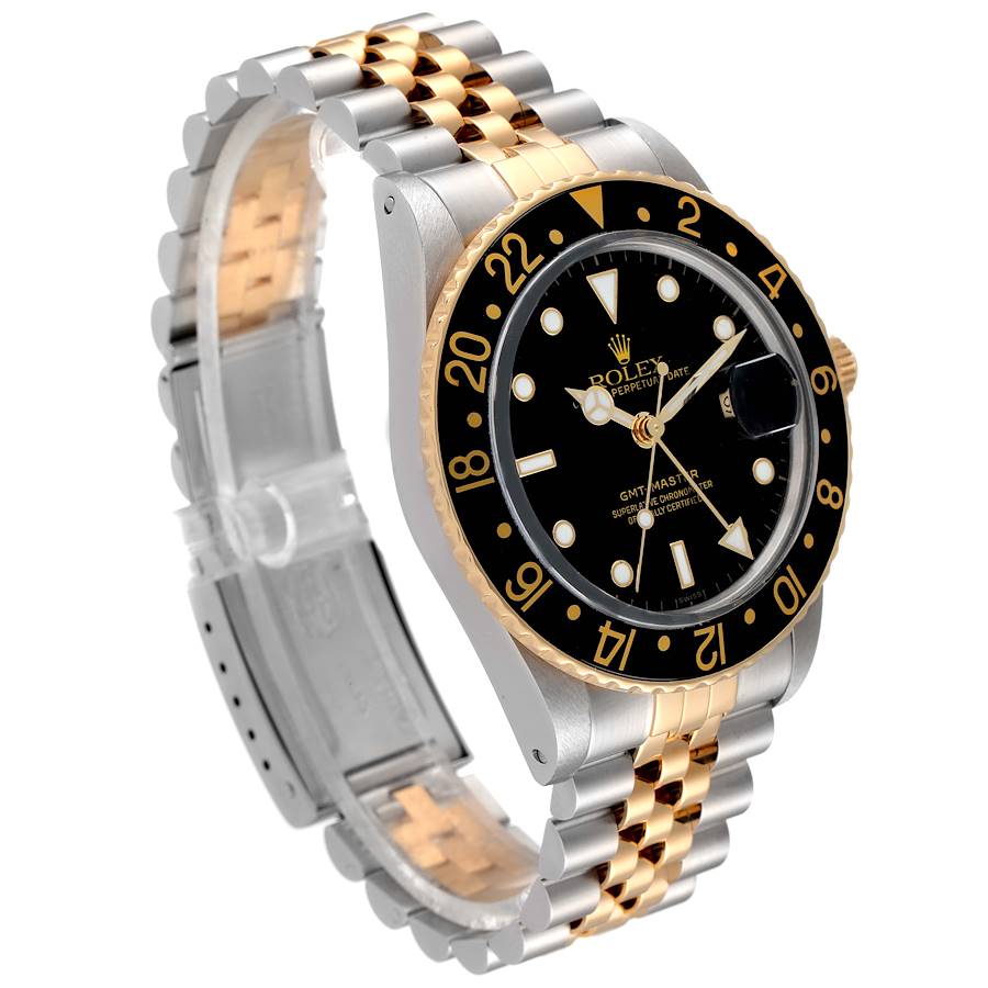 1985 Men's Rolex 40mm GMT Vintage Master 18K Gold / Stainless Steel Two Tone Wristwatch w/ Black Bezel & Black Dial. (Pre-Owned 16753)