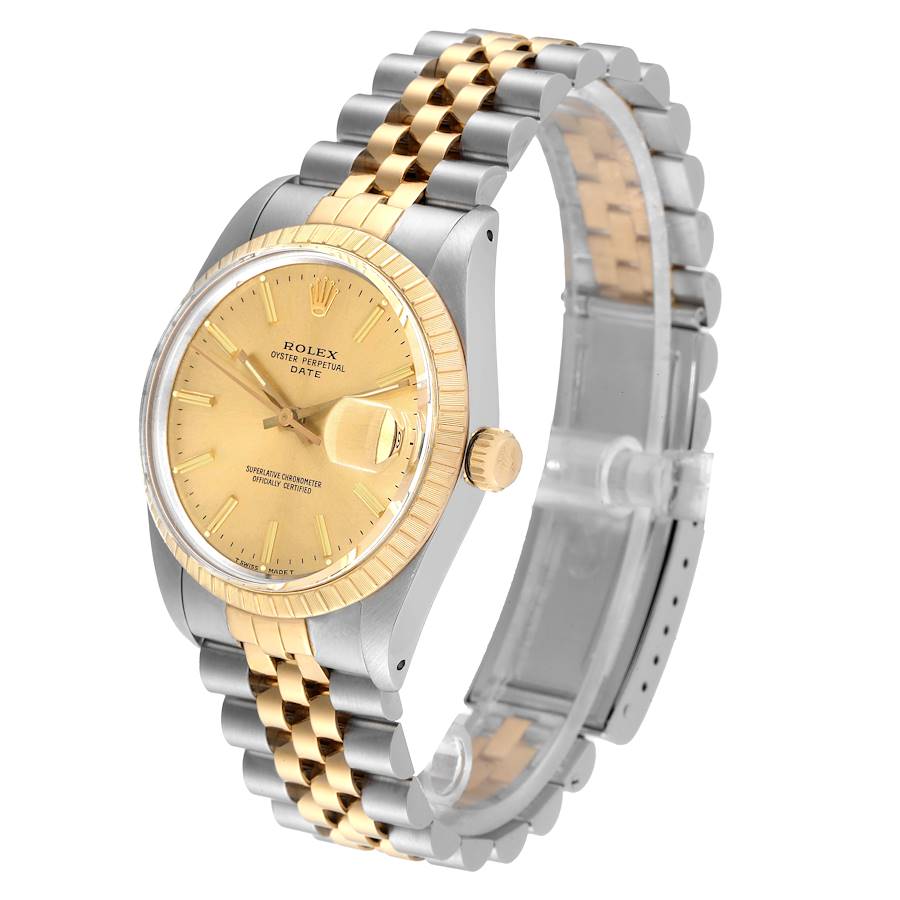 Ladies Rolex 26mm Date 18K Yellow Gold Two Tone Watch with Champagne Dial and Fluted Bezel. (Pre-Owned 69173)