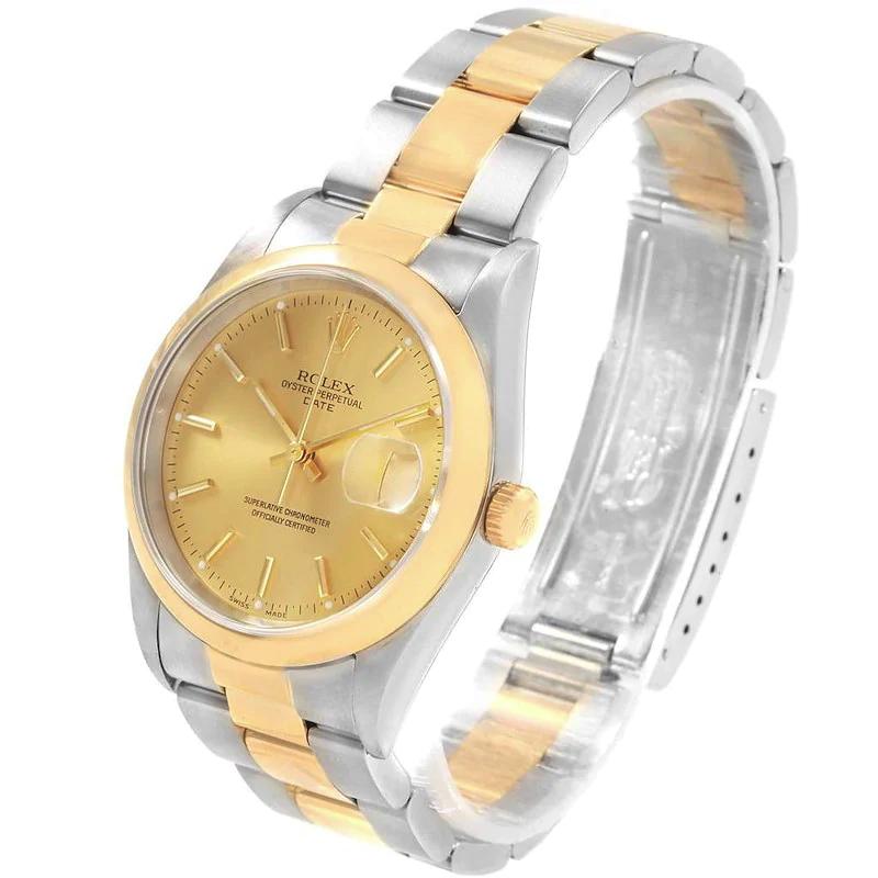 Ladies Rolex 26mm DateJust 18K Two Tone Wristwatch w/ Champagne Dial & Smooth Bezel. (Pre-Owned)