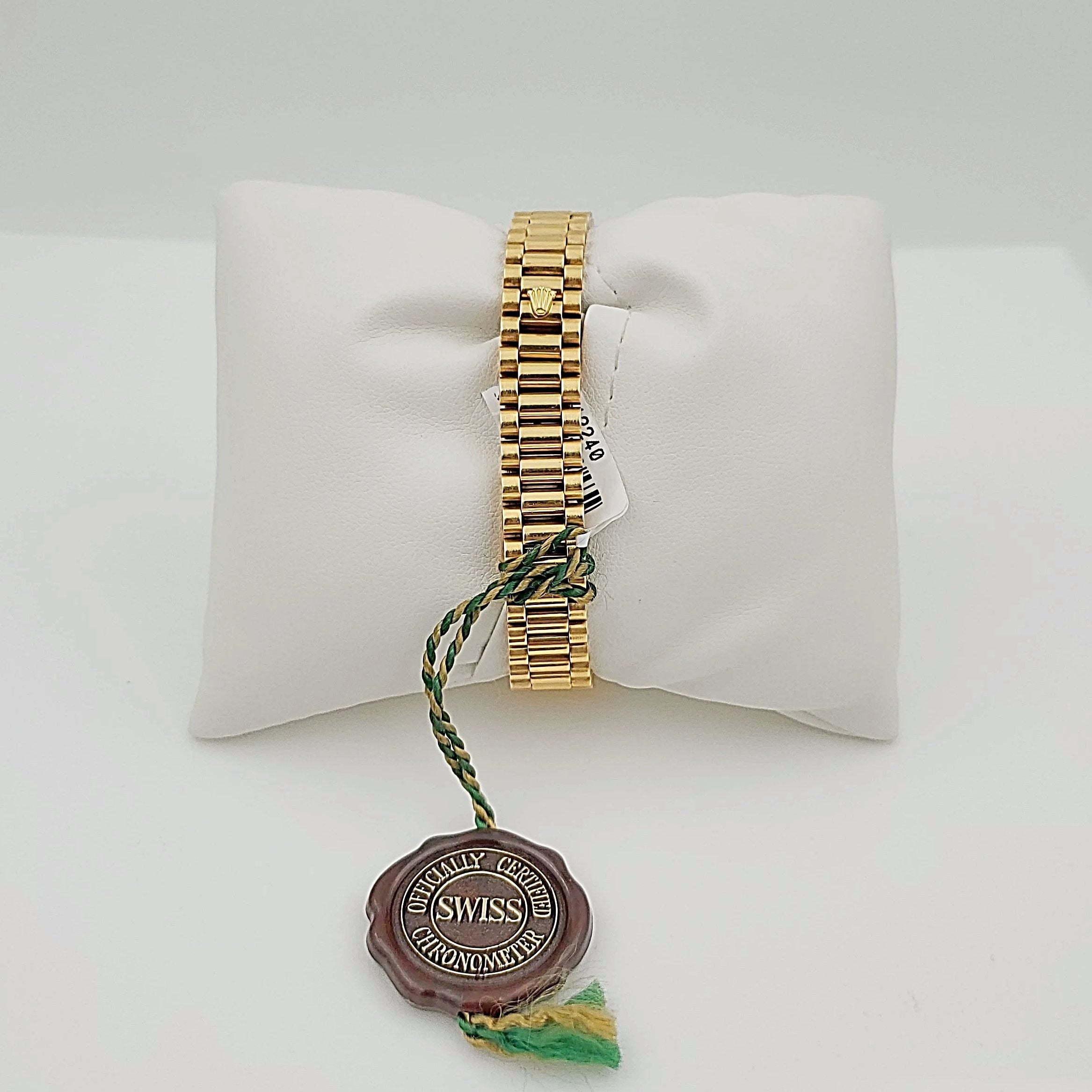 Ladies Rolex 26mm Presidential 18K Solid Yellow Gold Watch with Mother of Pearl Diamond Dial and Fluted Bezel. (Pre-Owned)