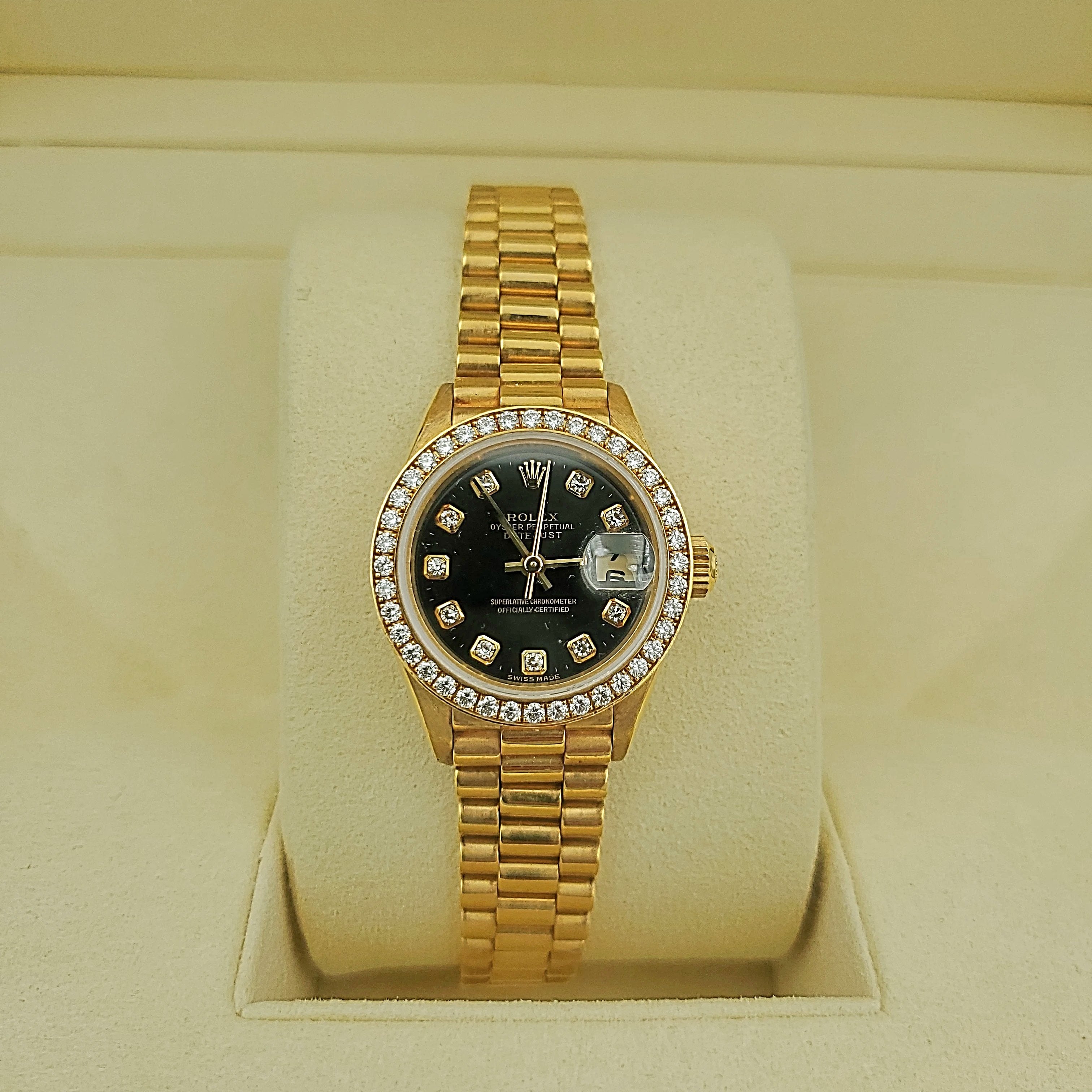 Ladies Rolex 26mm Presidential 18K Yellow Gold Watch with Black Diamond Dial and Diamond Bezel. (Pre-Owned)