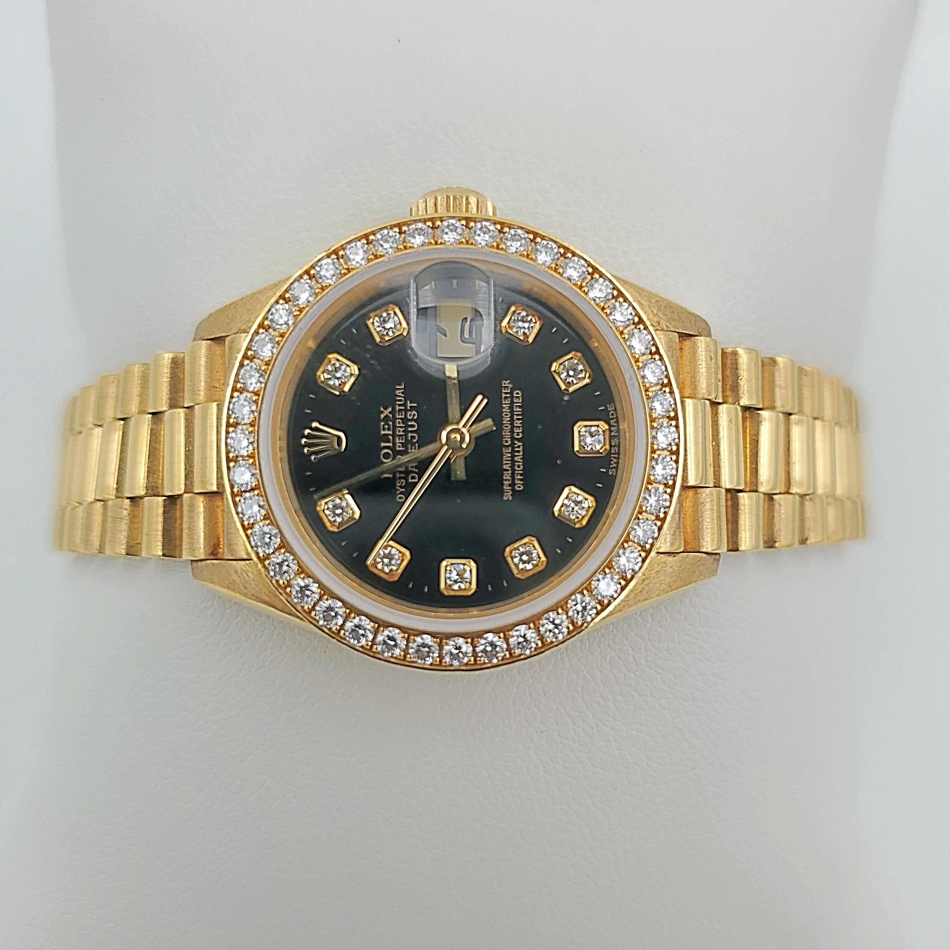 Ladies Rolex 26mm Presidential 18K Yellow Gold Watch with Black Diamond Dial and Diamond Bezel. (Pre-Owned)