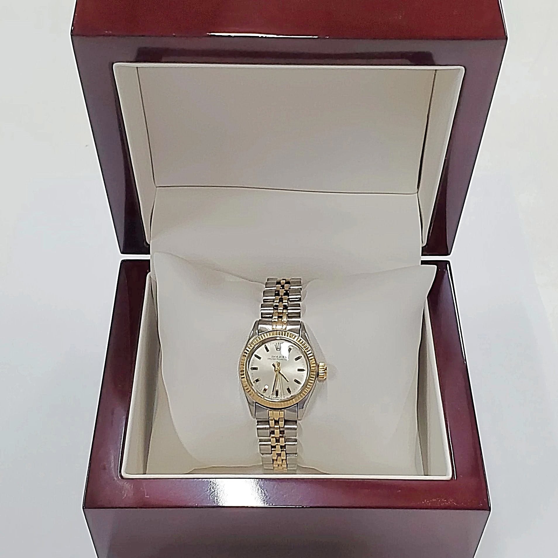 Ladies Rolex 26mm Two Tone DateJust 14K Gold Watch with Silver Dial and Fluted Bezel. (Pre-Owned)