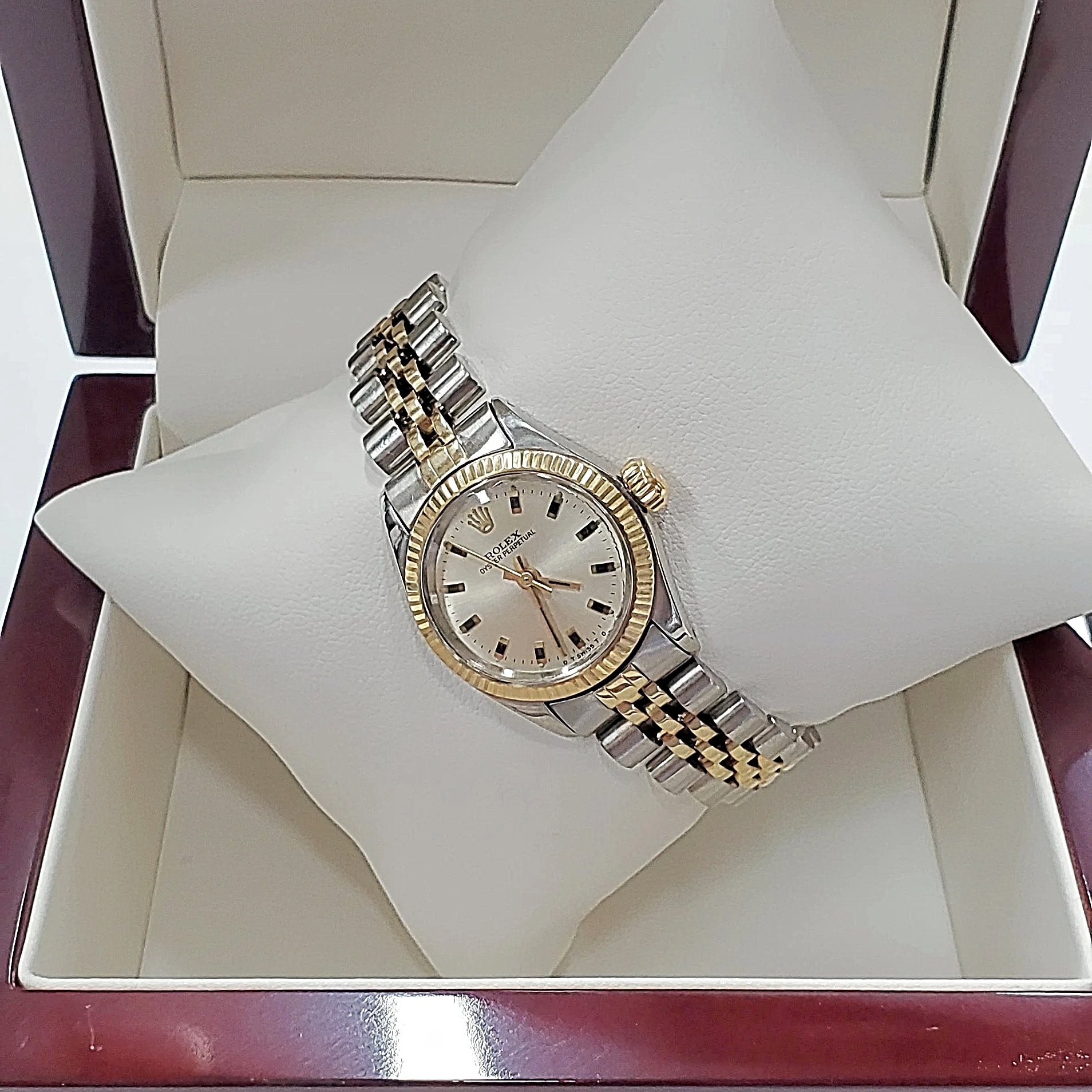 Ladies Rolex 26mm Two Tone DateJust 14K Gold Watch with Silver Dial and Fluted Bezel. (Pre-Owned)