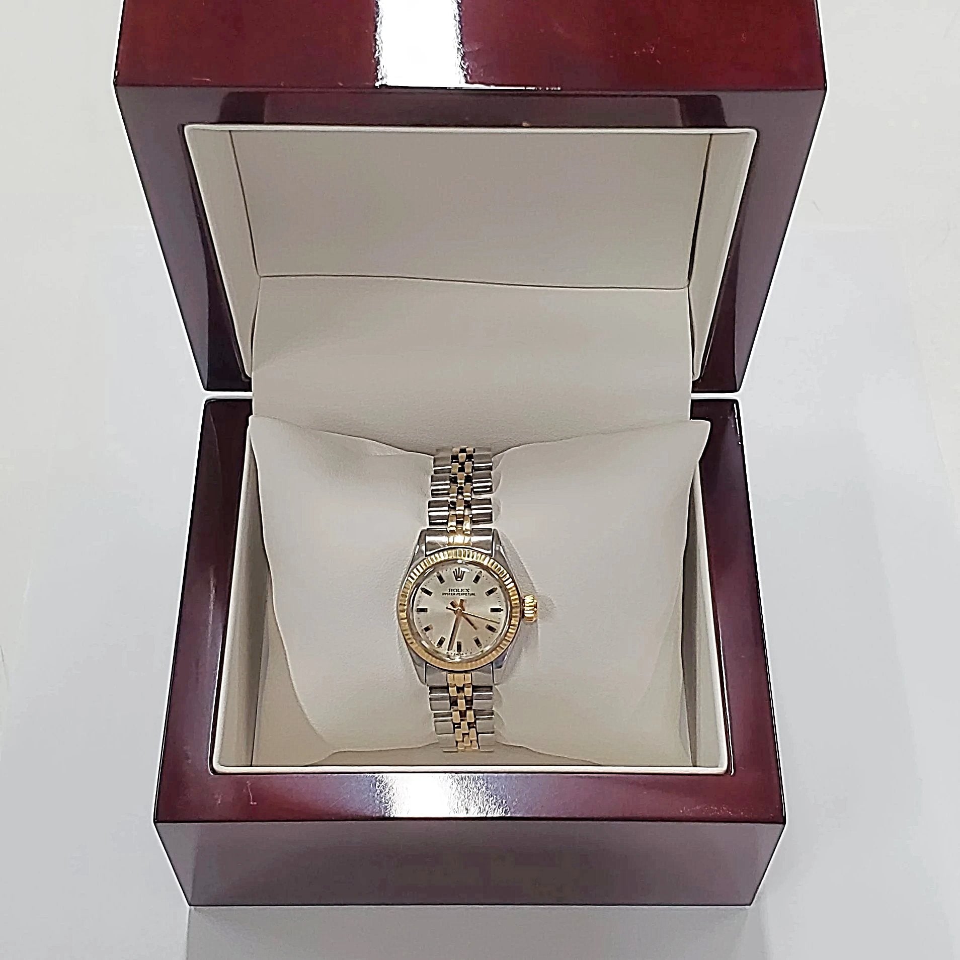 Ladies Rolex 26mm Two Tone DateJust 14K Gold Watch with Silver Dial and Fluted Bezel. (Pre-Owned)