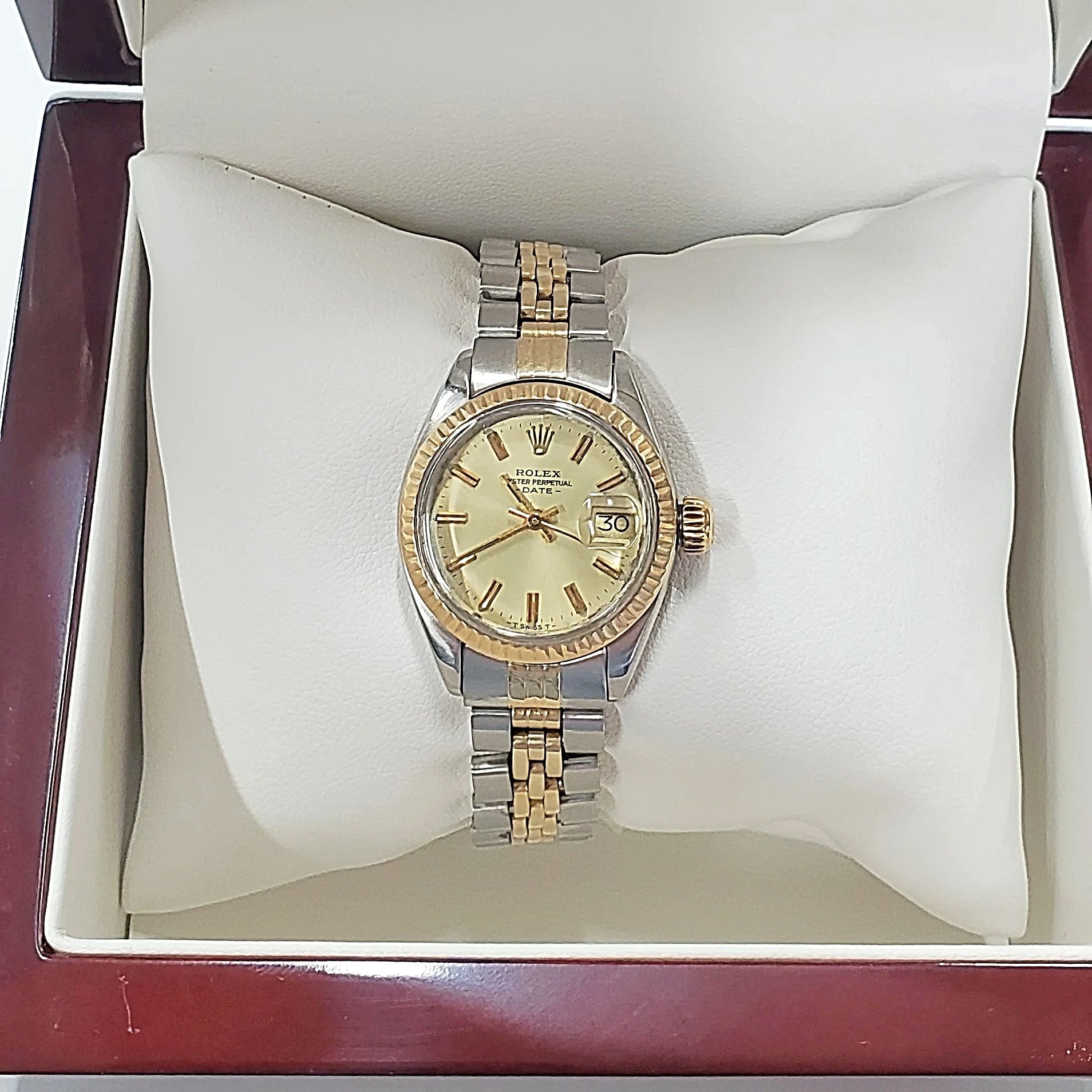 Ladies Rolex 26mm DateJust Two Tone 14K Gold Watch with Champagne Dial and Fluted Bezel. (Pre-Owned)