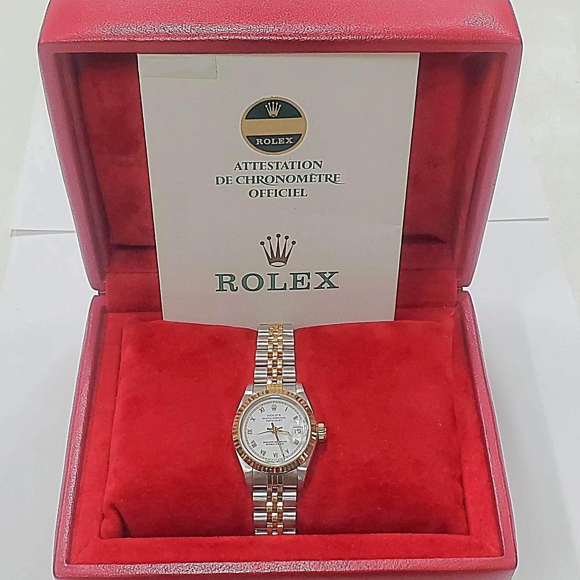 Ladies Rolex 26mm DateJust Two Tone 18K Gold Watch with White Dial, Fluted Bezel and Roman Numerals. (Pre-Owned)