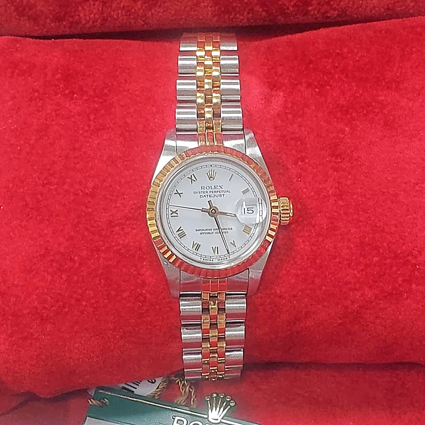 Ladies Rolex 26mm DateJust Two Tone 18K Gold Watch with White Dial, Fluted Bezel and Roman Numerals. (Pre-Owned)