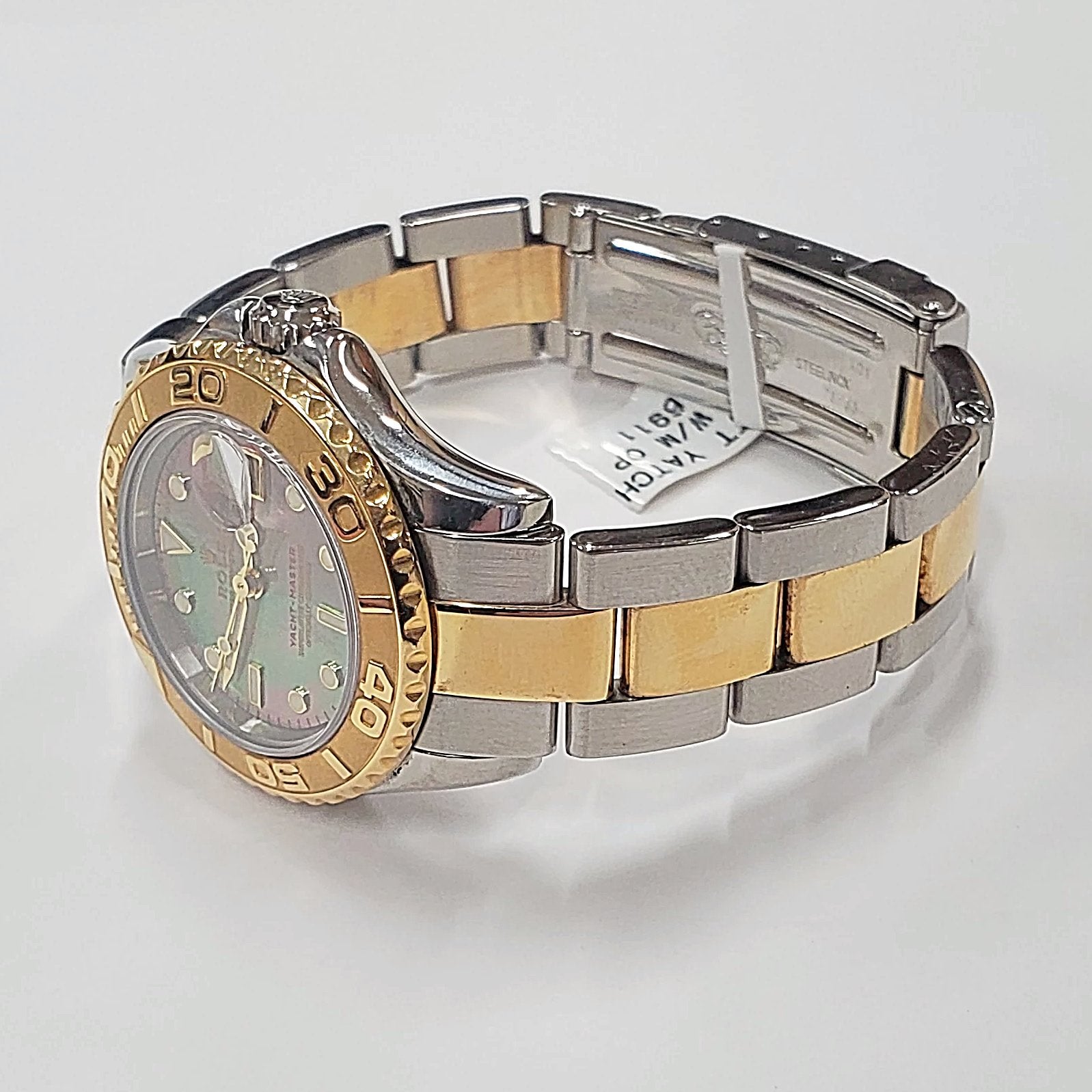 Ladies Rolex 29mm Two Tone 18K Gold Yachtmaster Watch with Black Mother of Pearl Dial and Rotatable Bezel. (Pre-Owned)