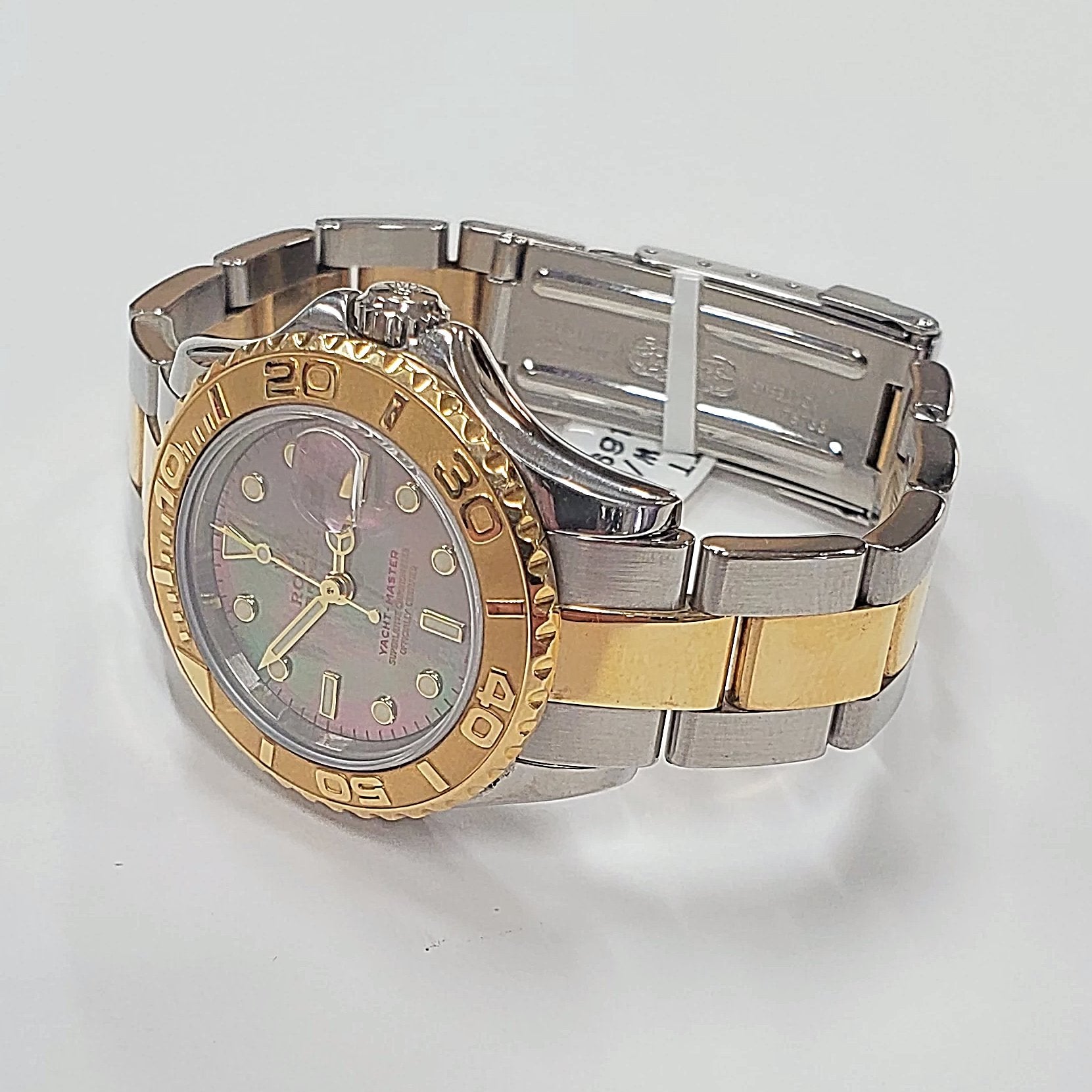 Women's Rolex 29mm Two-Tone 18K Gold Yacht Master Watch, with Black Mother of Pearl Dial, and Rotatable Bezel.