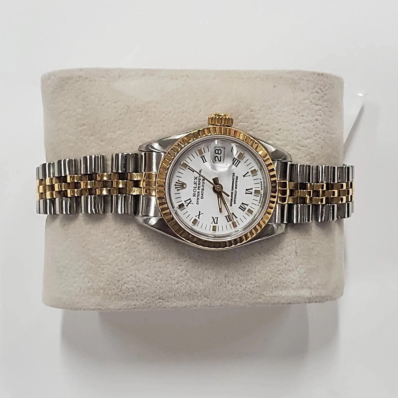 Ladies Rolex 26mm DateJust Two Tone 18K Gold Watch with Fluted Bezel, White Dial and Roman Numerals. (Pre-Owned)