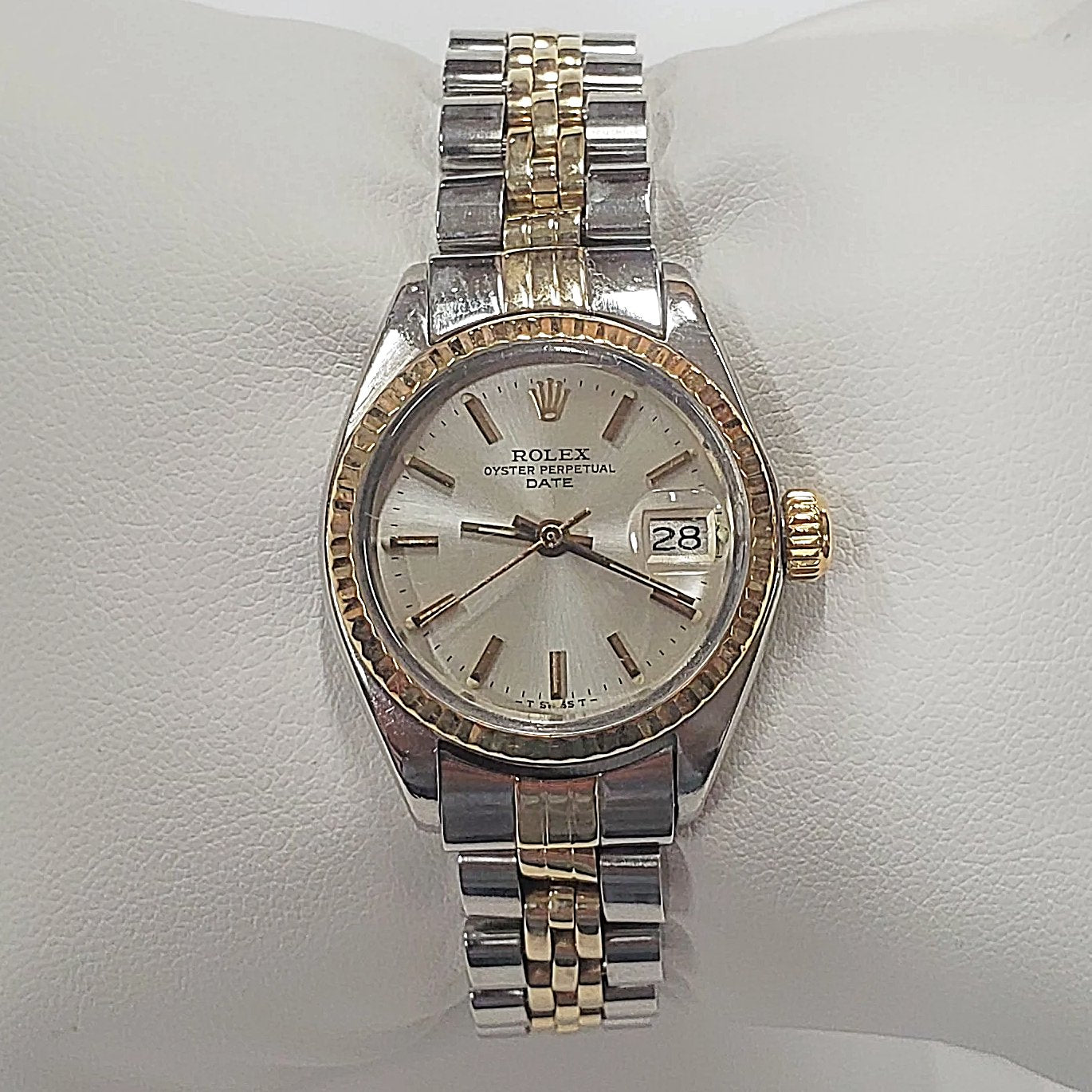 Ladies Rolex 26mm DateJust Two Tone 14K Yellow Gold / Stainless Steel Watch with Silver Dial and Fluted Bezel. (Pre-Owned)