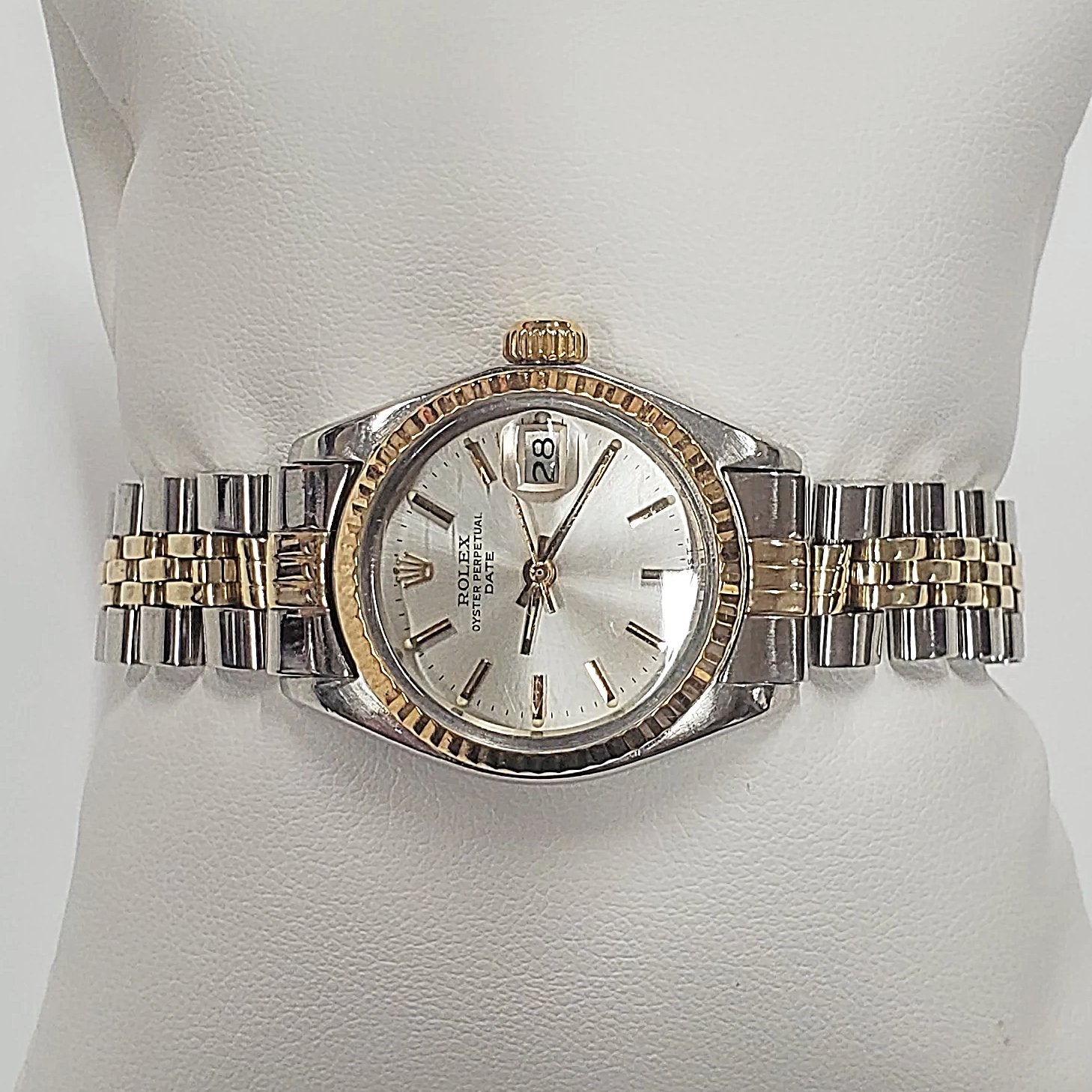 Ladies Rolex 26mm DateJust Two Tone 14K Yellow Gold / Stainless Steel Watch with Silver Dial and Fluted Bezel. (Pre-Owned)