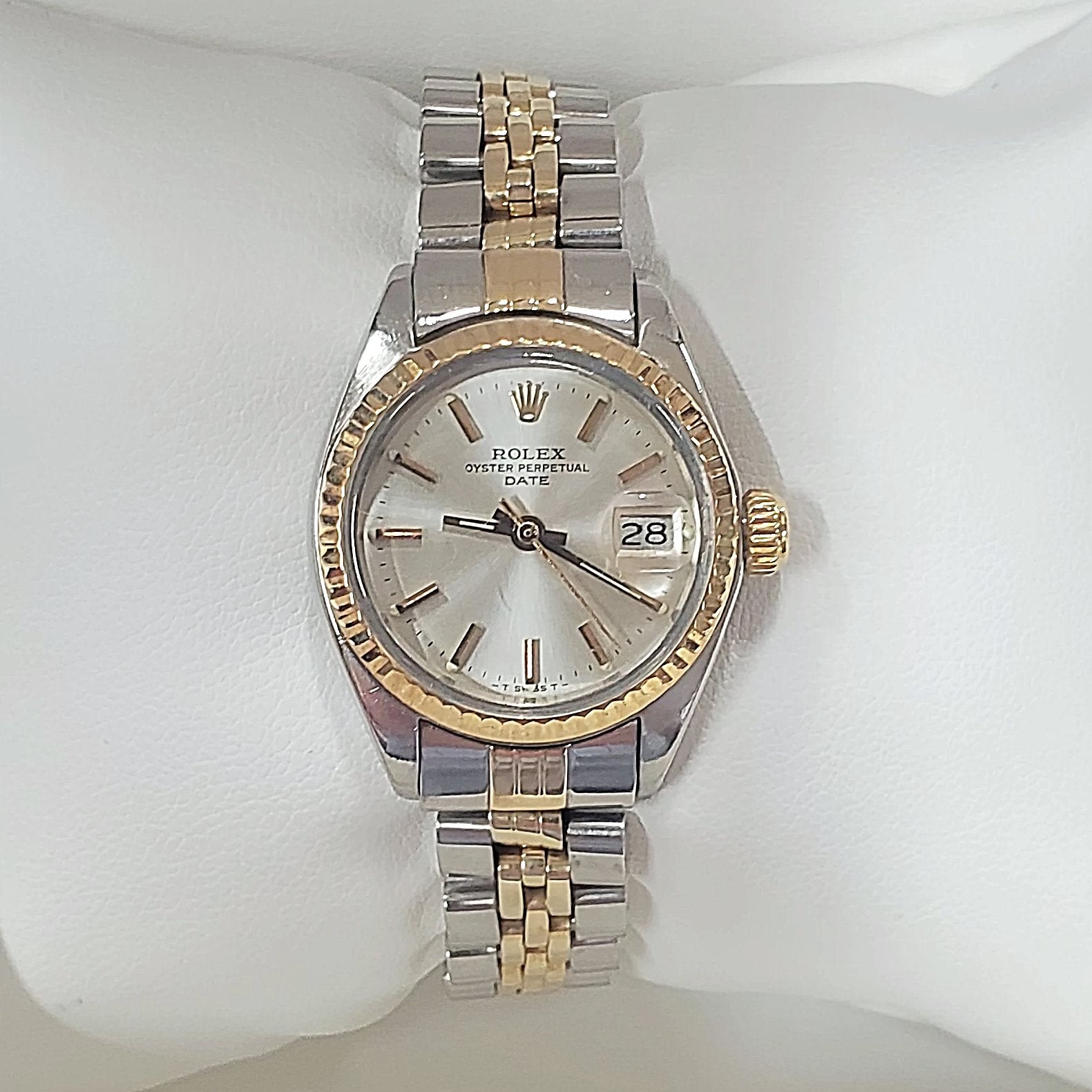 Ladies Rolex 26mm DateJust Two Tone 14K Yellow Gold / Stainless Steel Watch with Silver Dial and Fluted Bezel. (Pre-Owned)