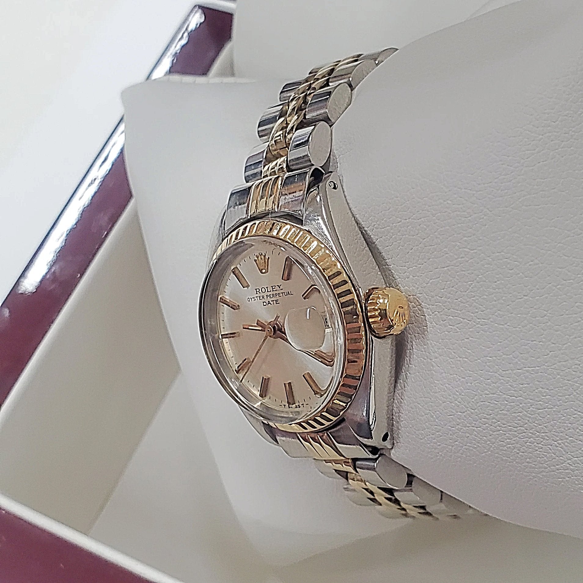 Ladies Rolex 26mm DateJust Two Tone 14K Yellow Gold / Stainless Steel Watch with Silver Dial and Fluted Bezel. (Pre-Owned)