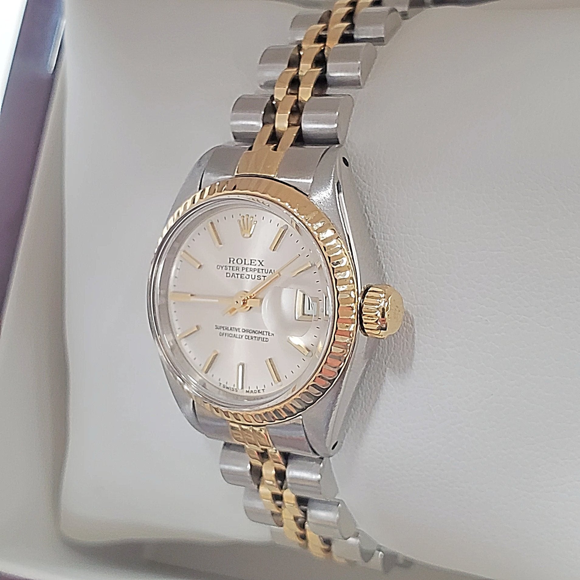 Women's Rolex Two-Tone Watch 26mm DateJust 14K Gold Watch with Silver Dial and 14K Fluted Bezel. (Pre-Owned)