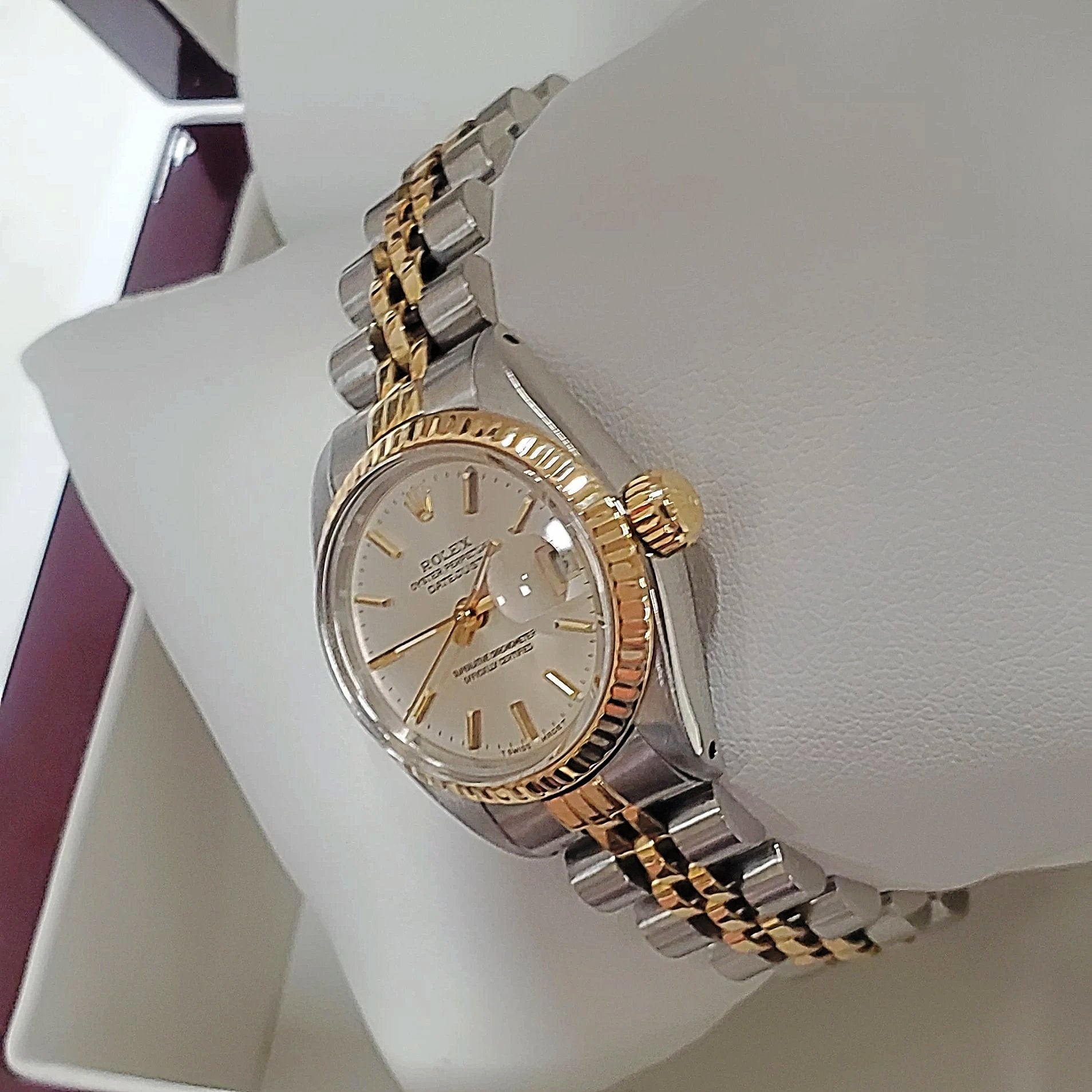 Ladies Rolex 26mm DateJust Two Tone 14K Yellow Gold / Stainless Steel Watch with Silver Dial and Fluted Bezel. (Pre-Owned)