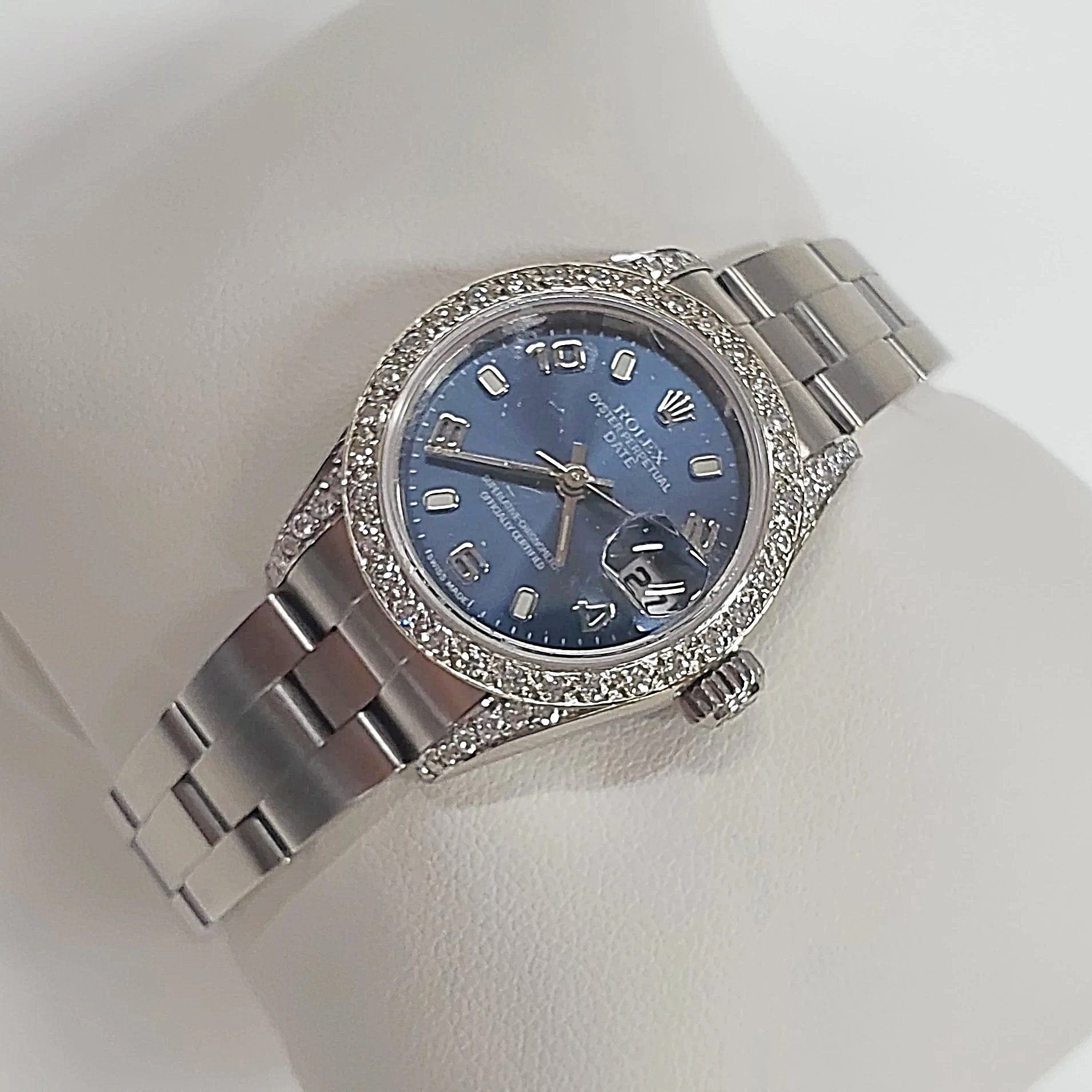 Ladies Rolex 26mm DateJust Stainless Steel Watch with Midnight Blue Dial and Diamond Bezel. (Pre-Owned)