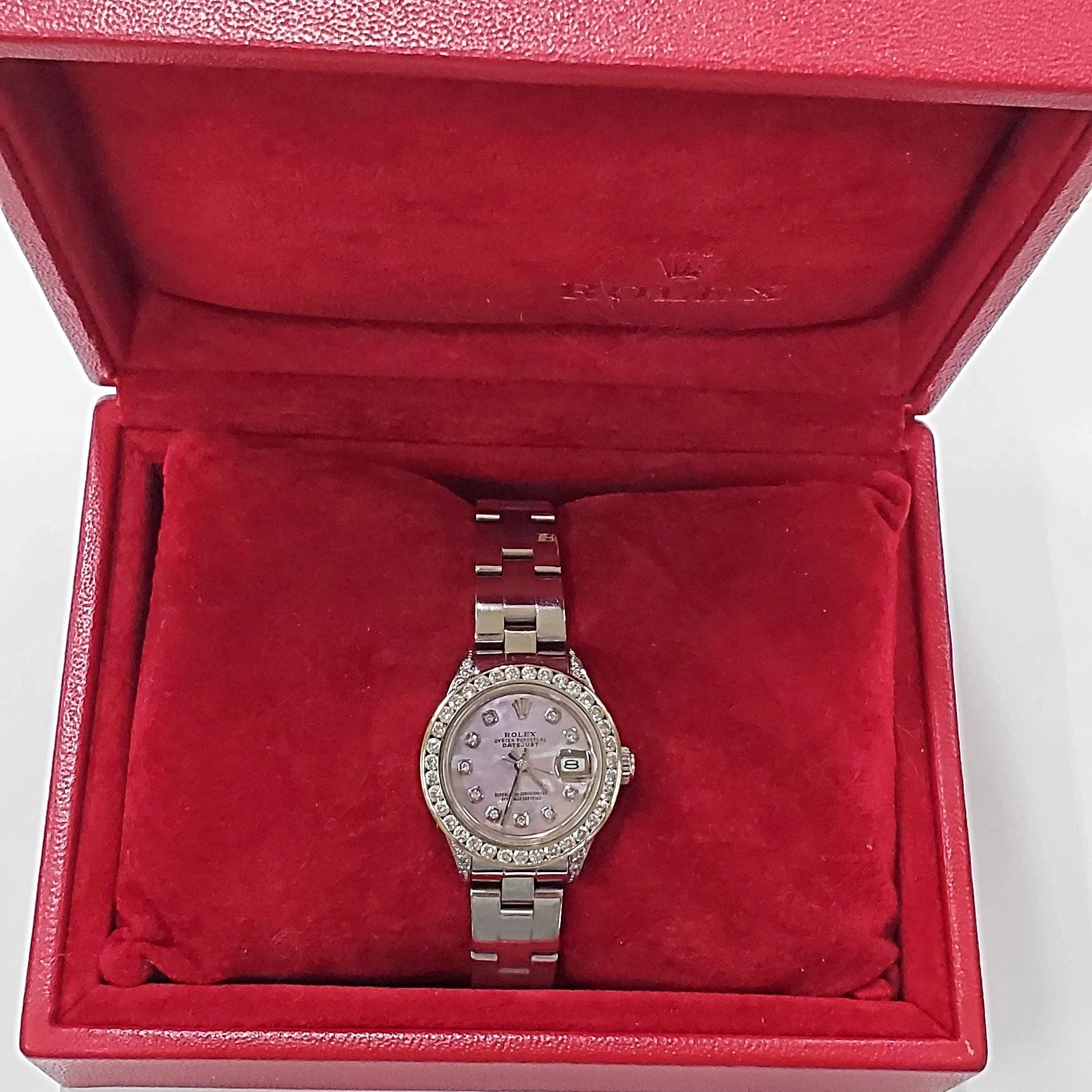 Ladies Rolex 26mm DateJust Stainless Steel Watch with Mother of Pearl Diamond Dial and Custom Diamond Bezel. (Pre-Owned)