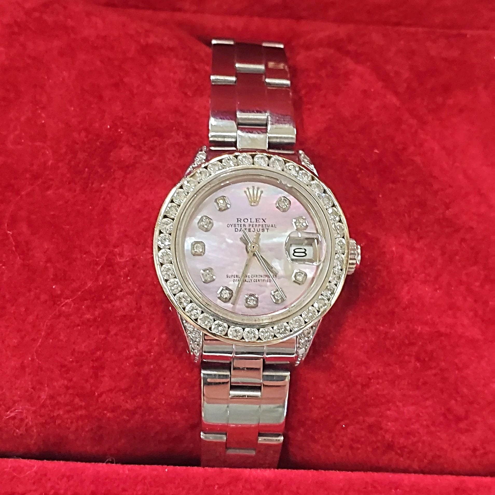 Ladies Rolex 26mm DateJust Stainless Steel Watch with Mother of Pearl Diamond Dial and Custom Diamond Bezel. (Pre-Owned)