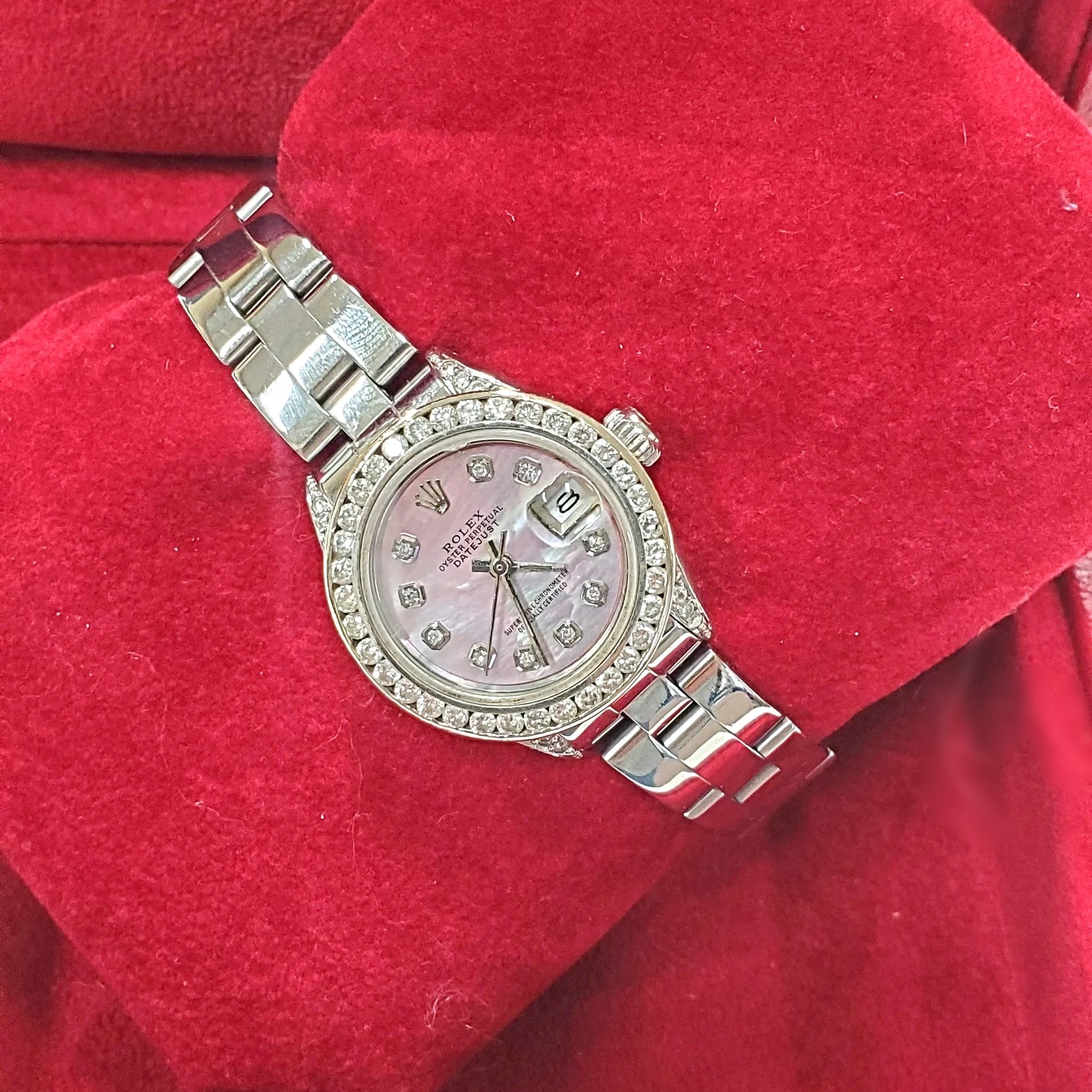 Ladies Rolex 26mm DateJust Stainless Steel Watch with Mother of Pearl Diamond Dial and Custom Diamond Bezel. (Pre-Owned)