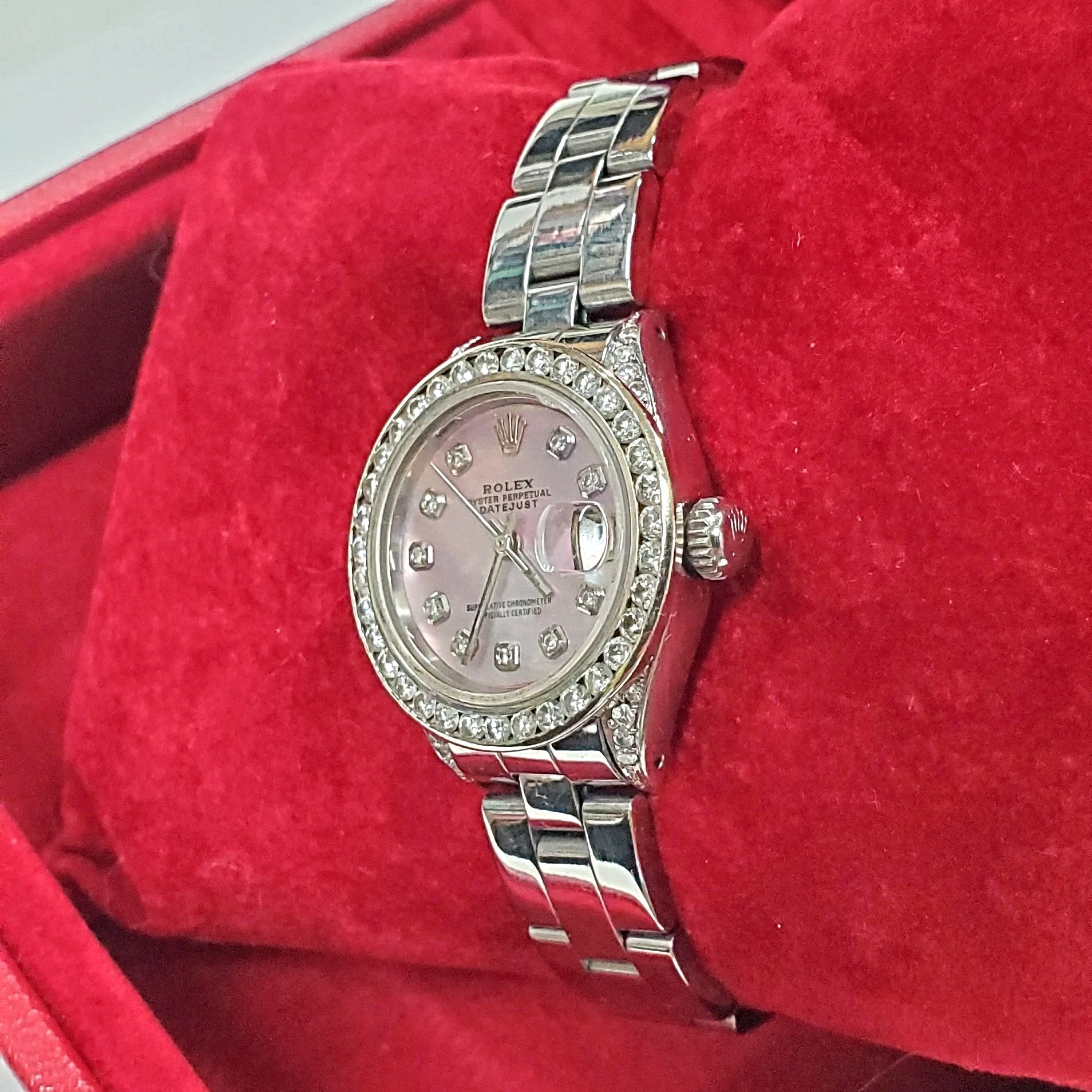 Ladies Rolex 26mm DateJust Stainless Steel Watch with Mother of Pearl Diamond Dial and Custom Diamond Bezel. (Pre-Owned)