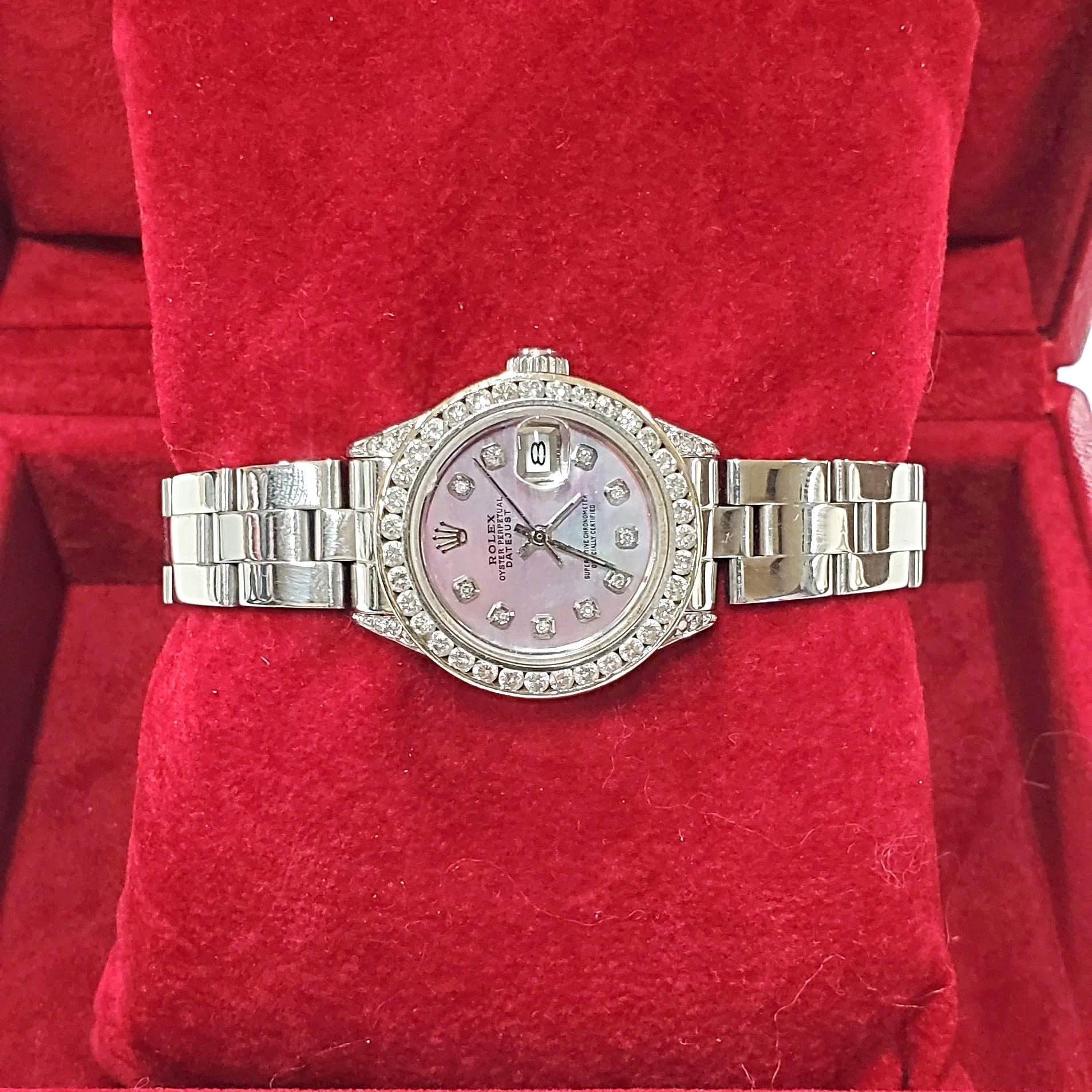 Ladies Rolex 26mm DateJust Stainless Steel Watch with Mother of Pearl Diamond Dial and Custom Diamond Bezel. (Pre-Owned)