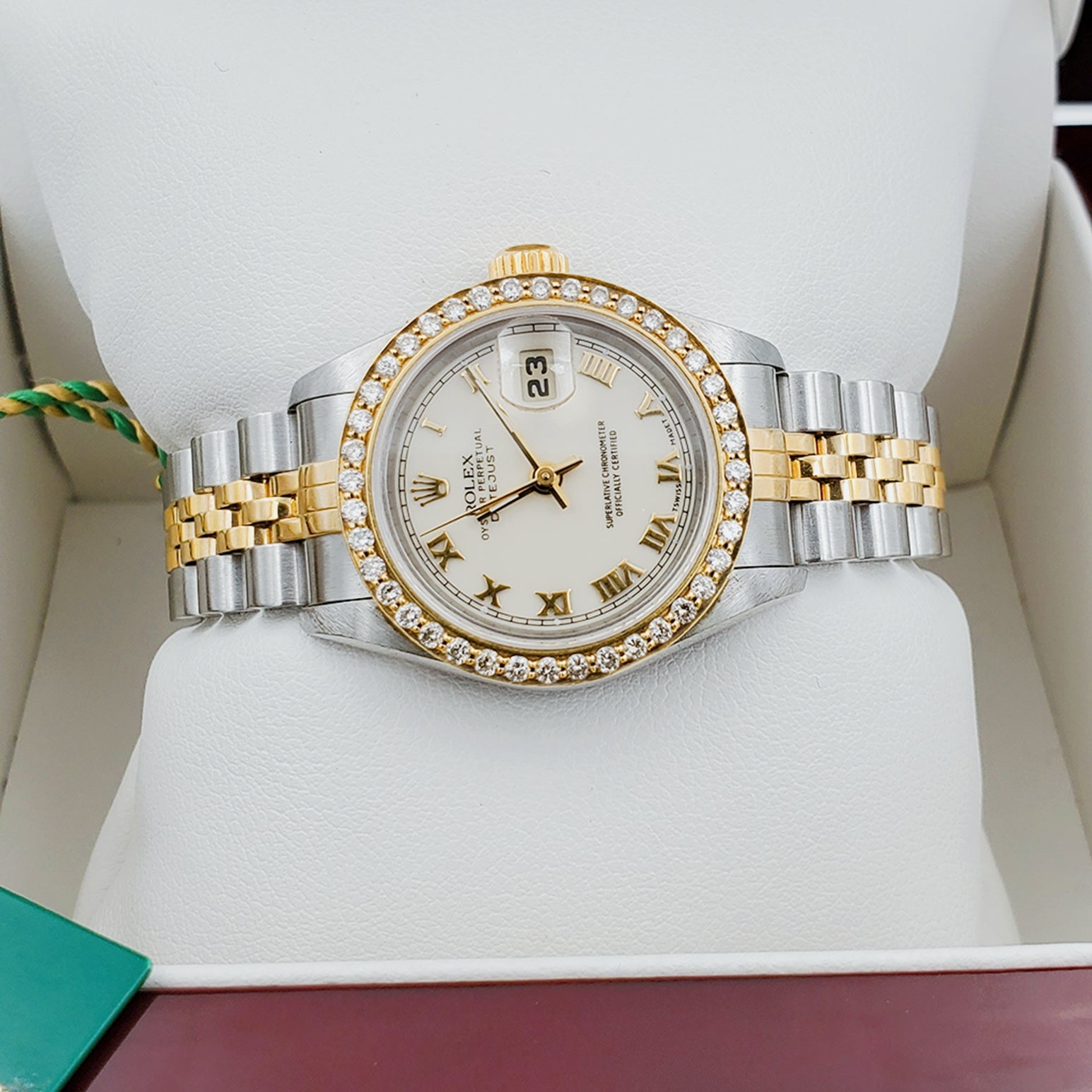 Ladies Rolex 18K Gold Two Tone 26mm DateJust Watch with Off-White Dial, Roman Numerals and Diamond Bezel. (Pre-Owned)