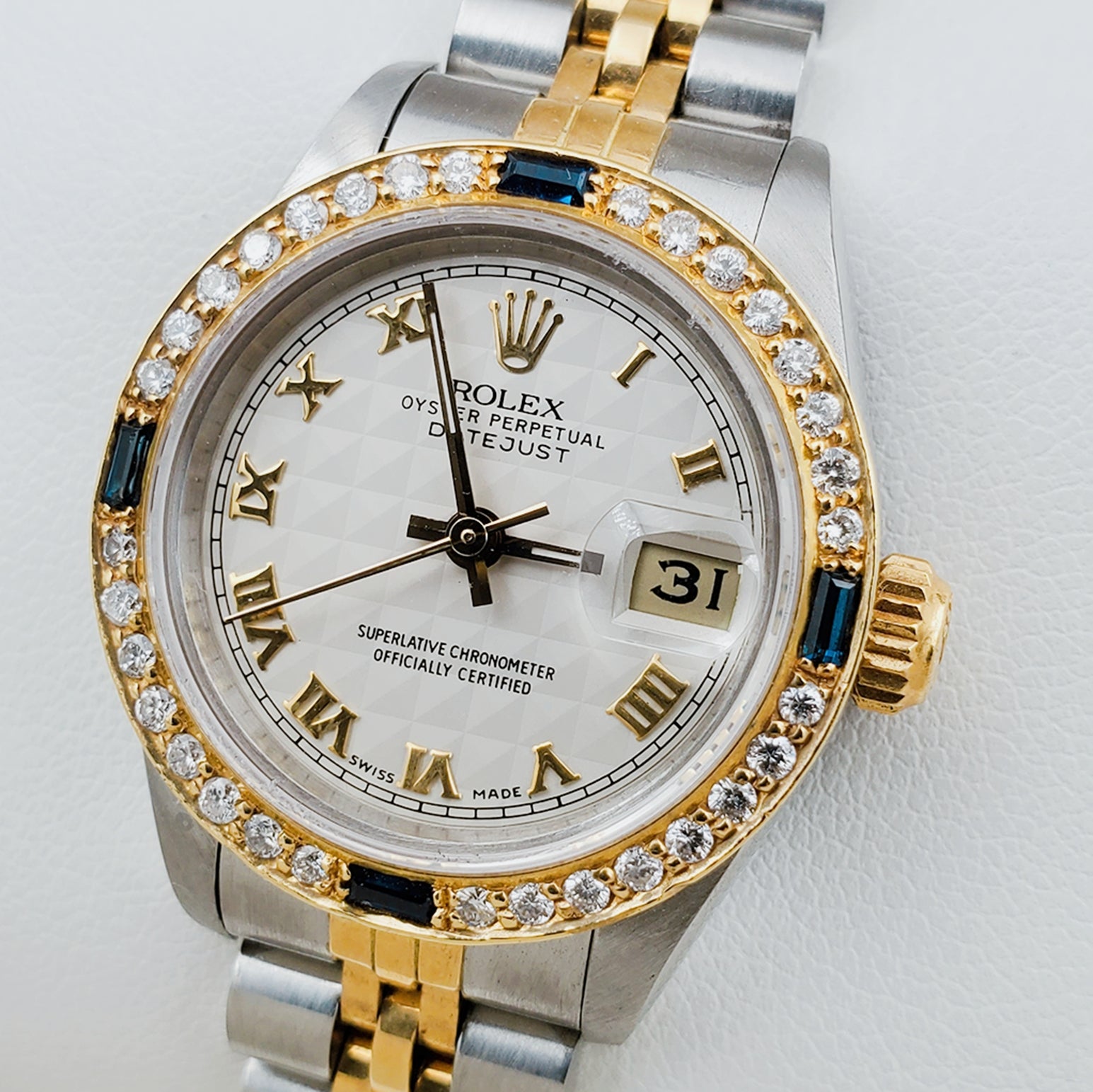 Ladies Rolex 18K Gold Two Tone 26mm DateJust Watch with Roman Numerals, Off-White Dial and Sapphire Diamond Bezel. (Pre-Owned)