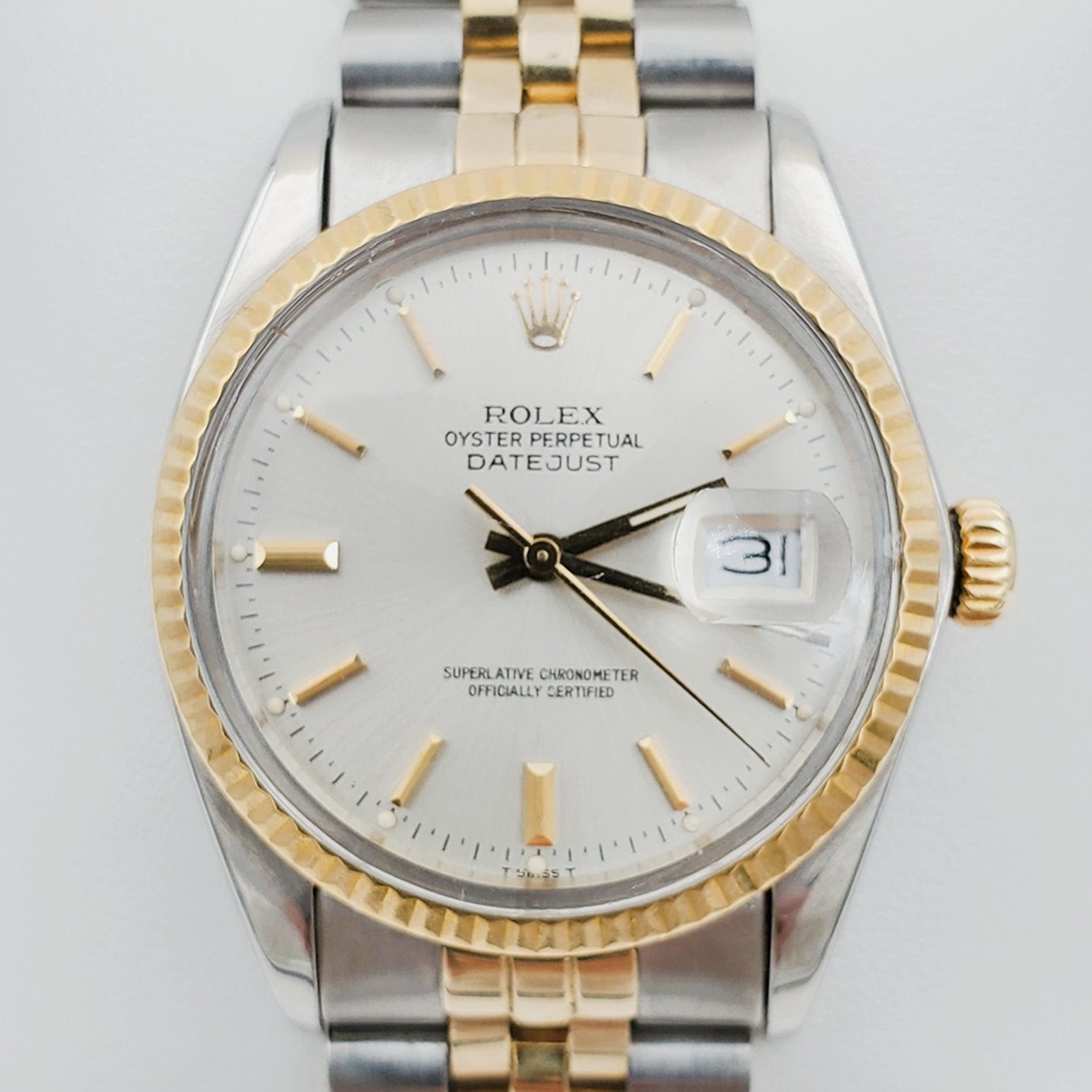 Men's Rolex 36mm DateJust 18k Gold / Stainless Steel Two Tone Watch with Silver Dial and Fluted Bezel. (Pre-Owned 16233)