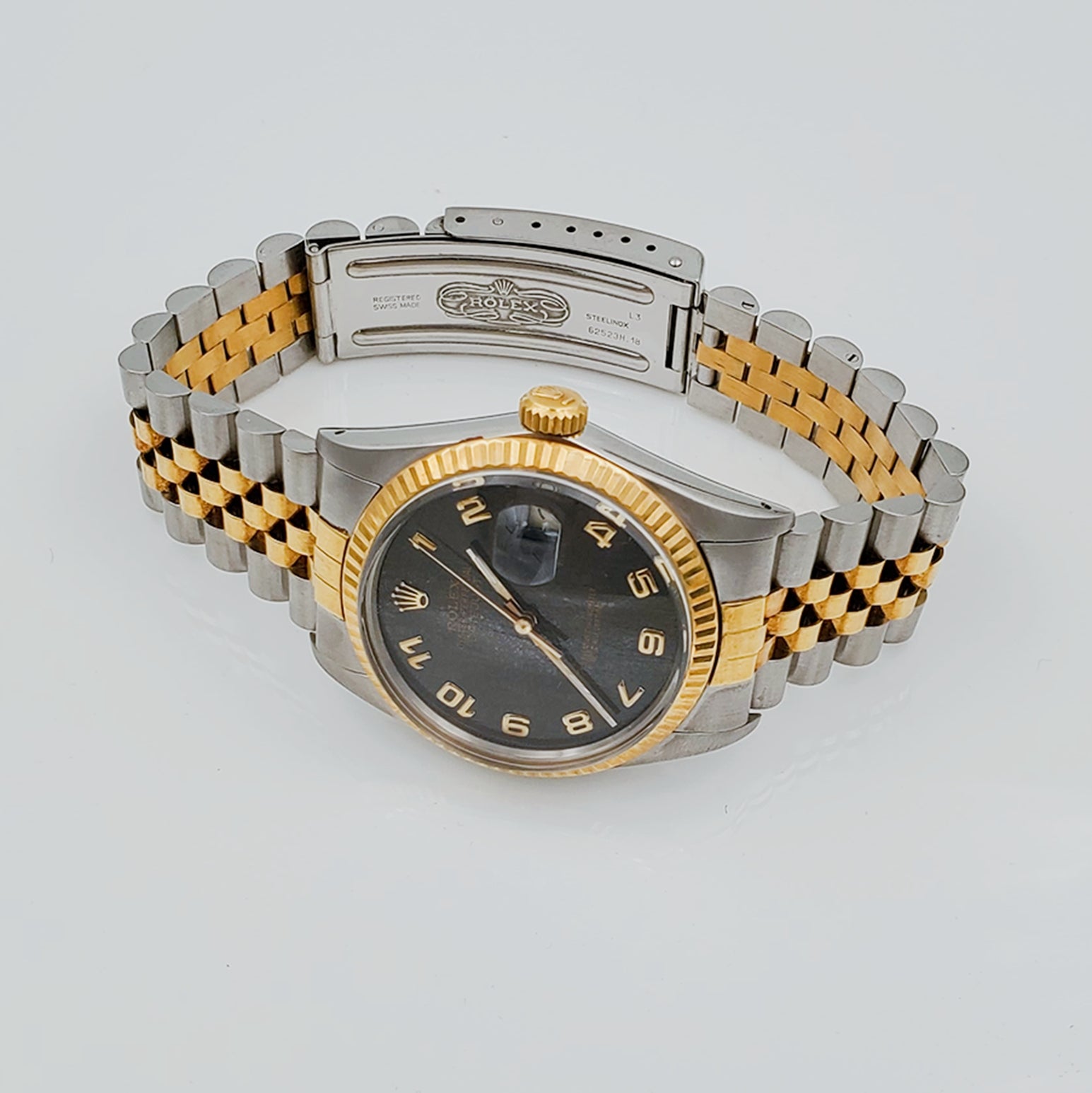 Men's Rolex 36mm DateJust 18k Gold / Stainless Steel Two Tone Watch with Gray/Black Dial and Fluted Bezel. (Pre-Owned)