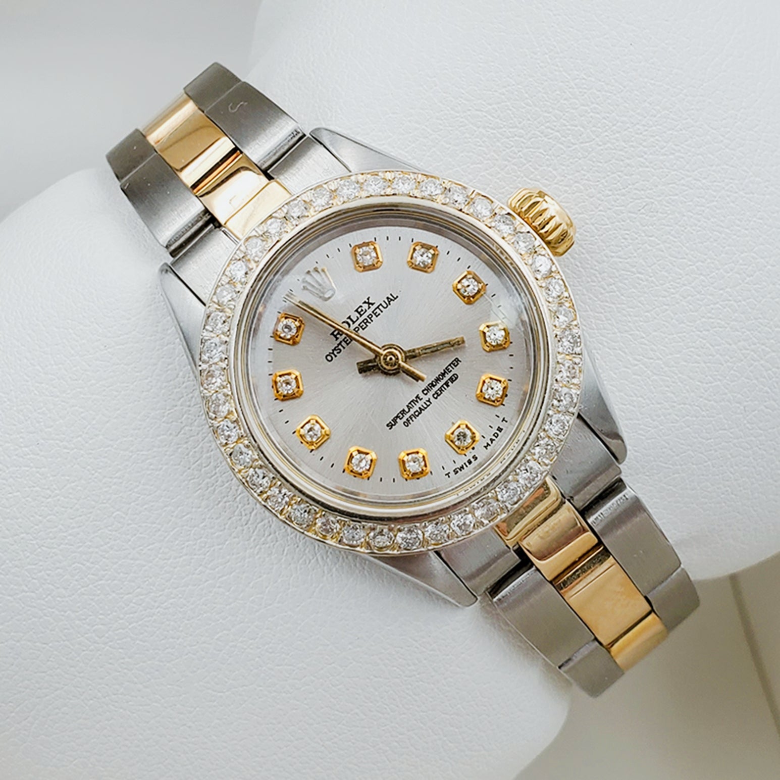 Ladies Rolex 26mm DateJust 18K Two Tone Watch with Silver Diamond Dial and Custom Diamond Bezel. (Pre-Owned)