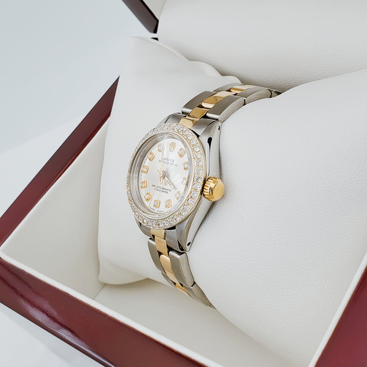 Ladies Rolex 26mm DateJust 18K Two Tone Watch with Silver Diamond Dial and Custom Diamond Bezel. (Pre-Owned)