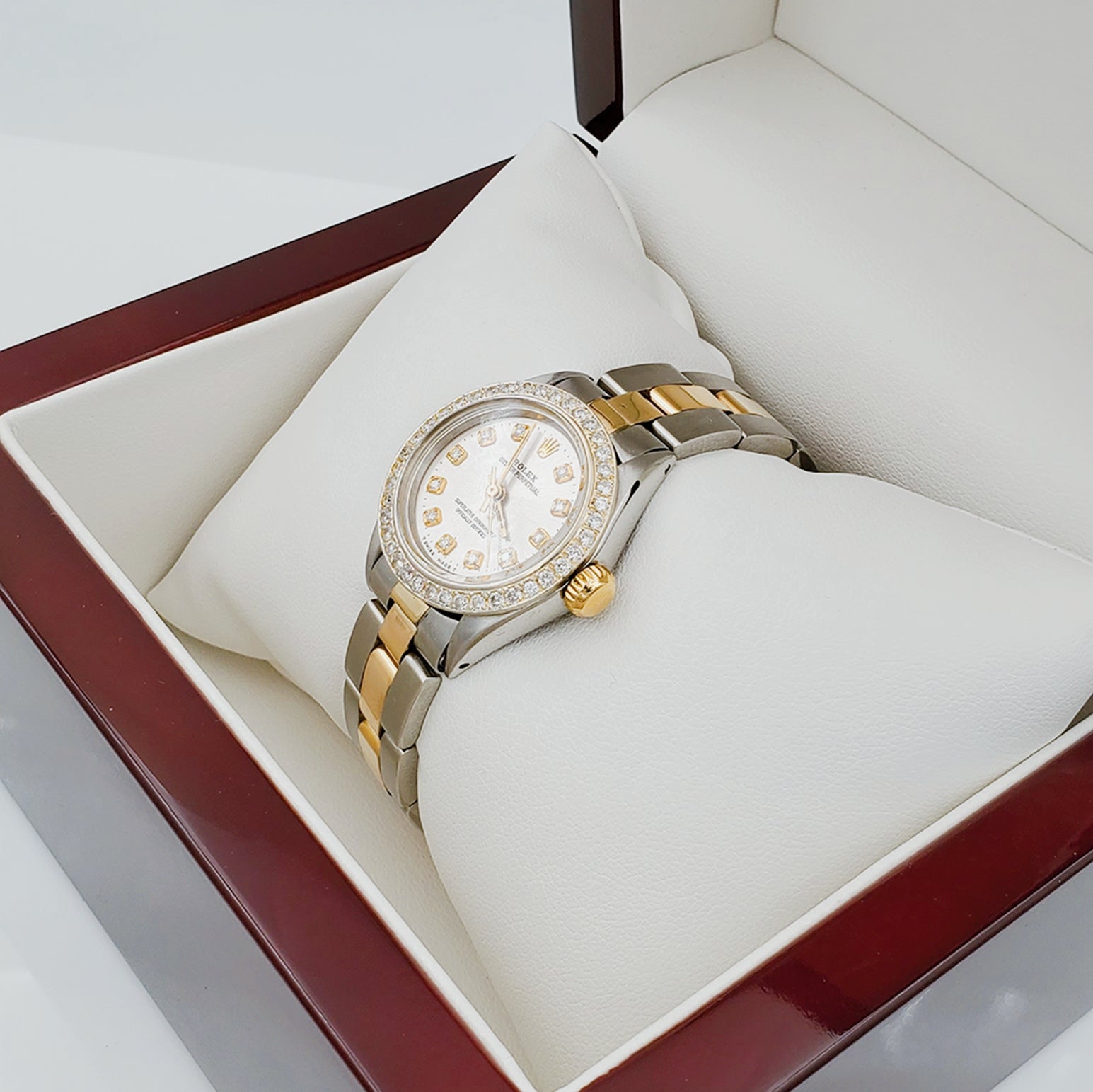 Ladies Rolex 26mm DateJust 18K Two Tone Watch with Silver Diamond Dial and Custom Diamond Bezel. (Pre-Owned)