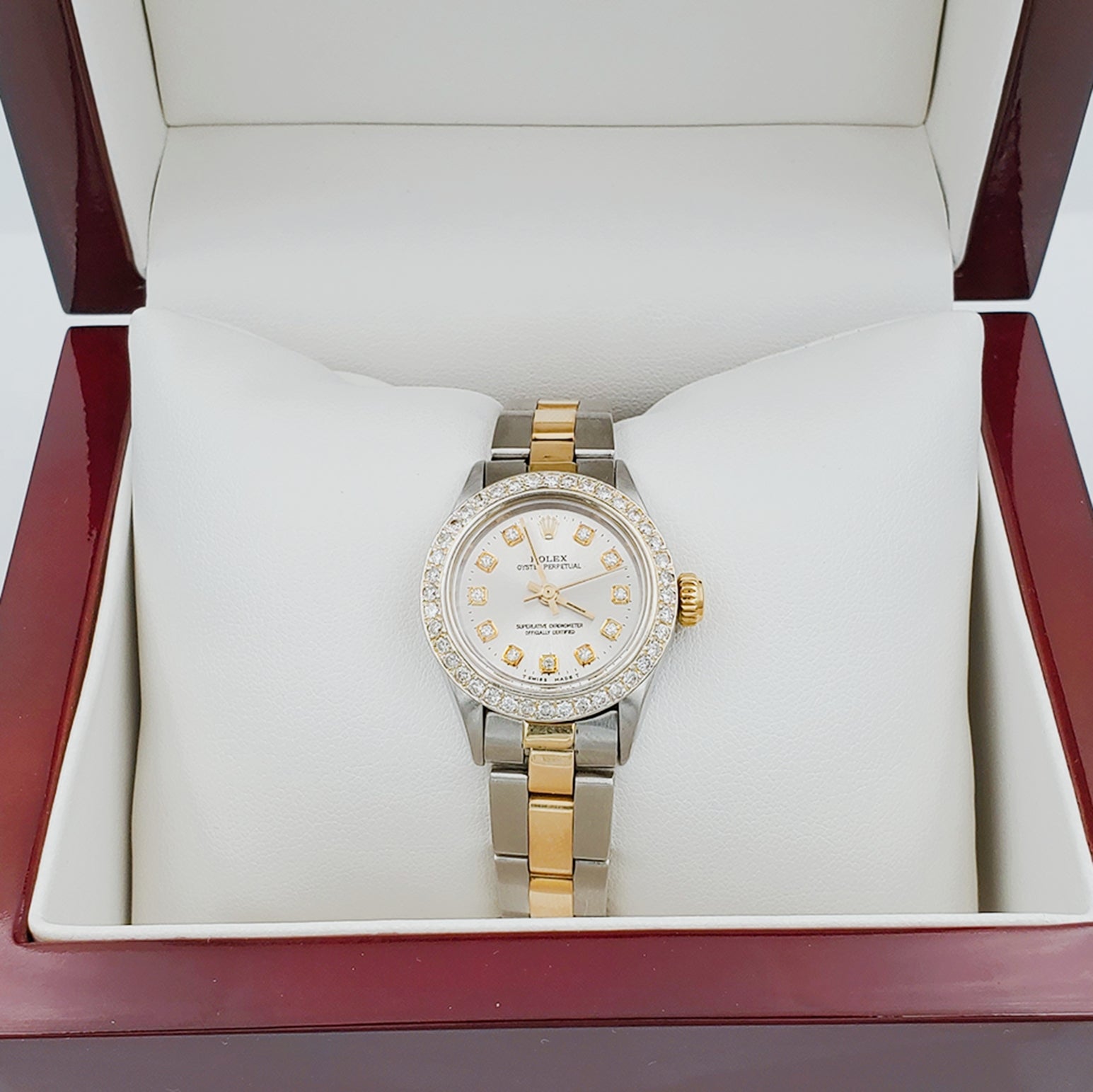 Ladies Rolex 26mm DateJust 18K Two Tone Watch with Silver Diamond Dial and Custom Diamond Bezel. (Pre-Owned)