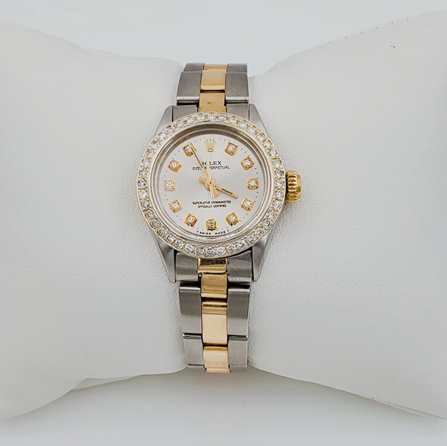 Ladies Rolex 26mm DateJust 18K Two Tone Watch with Silver Diamond Dial and Custom Diamond Bezel. (Pre-Owned)