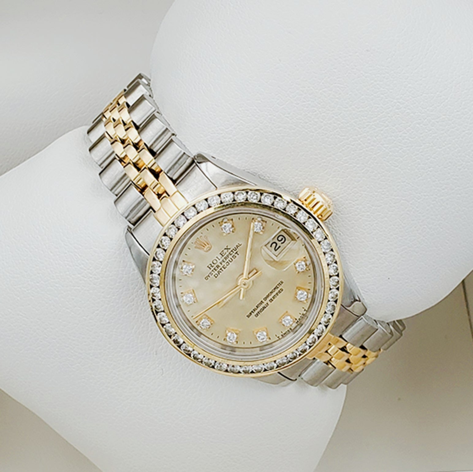 Ladies Rolex 26mm DateJust 18K Gold / Two Tone Stainless Steel Watch with Champagne Diamond Dial and Diamond Bezel. (Pre-Owned)